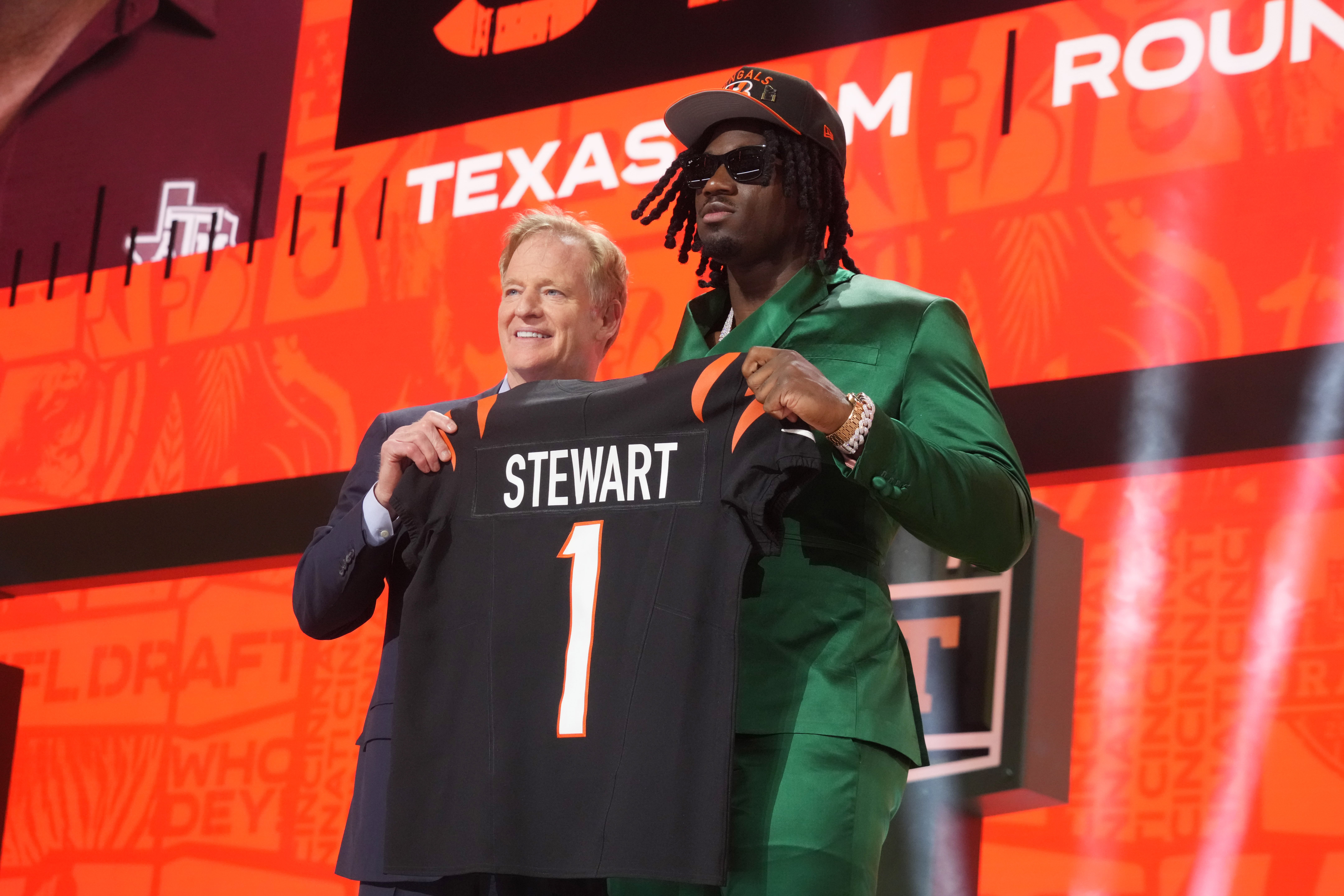Apr 24, 2025; Green Bay, WI, USA; NFL commissioner Roger Goodell with Texas A&M Aggies defensive end Shemar Stewart after her is selected by the Cincinnati Bengals as the number seventeen pick in the first round of the 2025 NFL Draft at Lambeau Field.