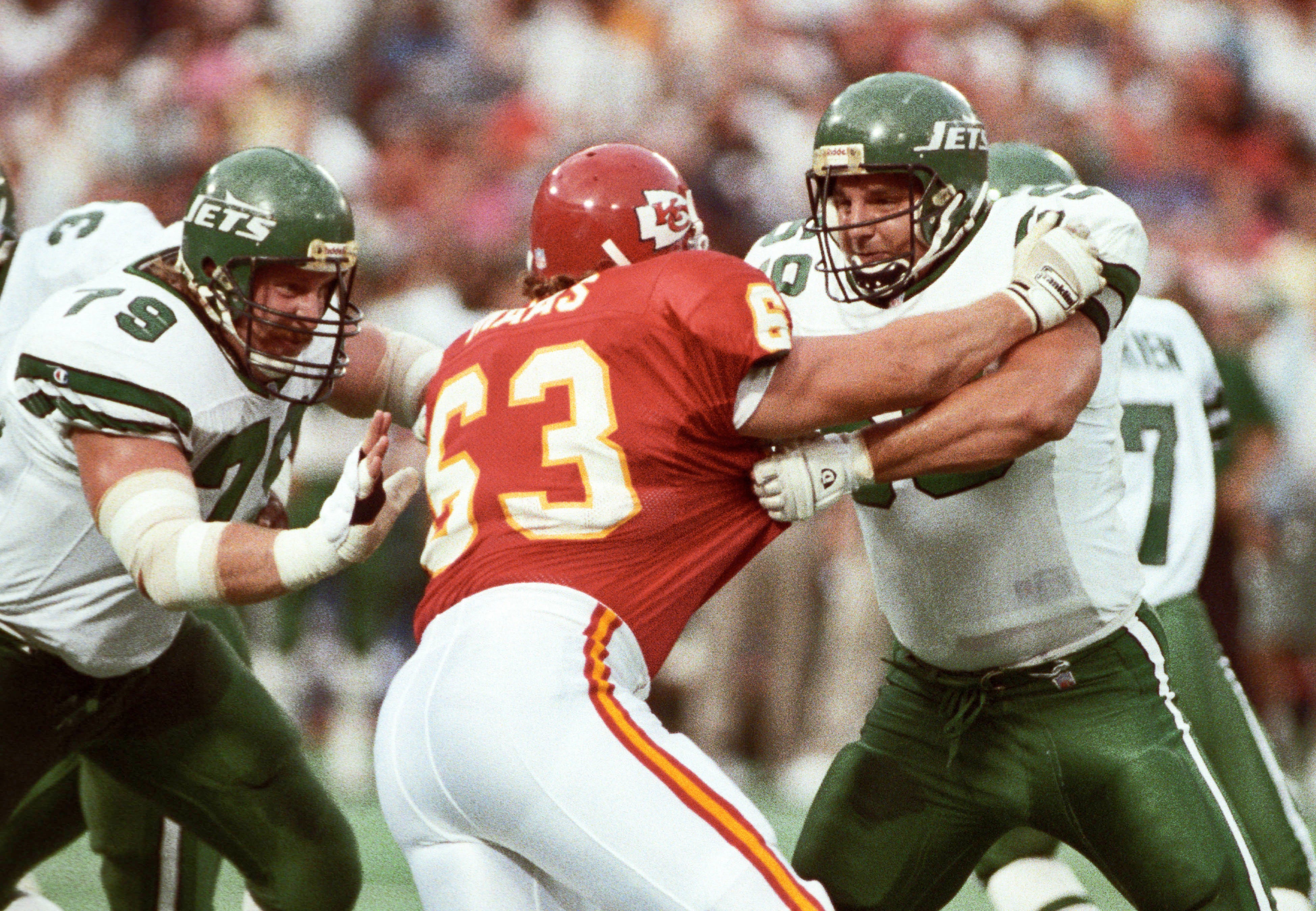 Aug 10, 1991; St. Louis, MO, USA; FILE PHOTO; New York Jets offensive linemen Jeff Criswell (69) and Mike Haight (79) in action against Kanas City Chiefs defensive end Bill Maas (63) at Busch Stadium during the 1991 preseason.