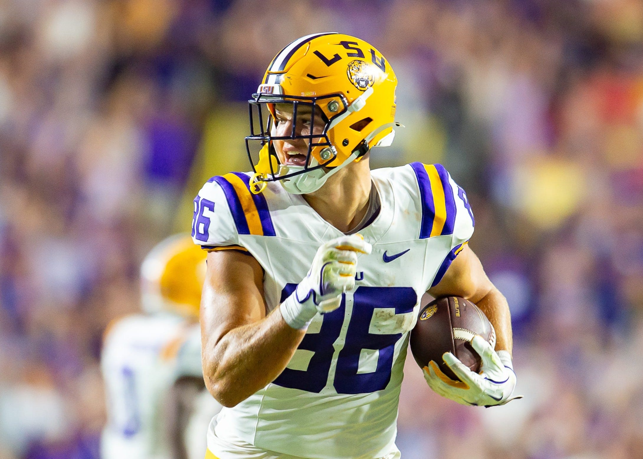 Mason Taylor 86 runs the ball as the LSU Tigers take on the Ole Miss Rebels at Tiger Stadium in Baton Rouge, Louisiana, on Oct. 12, 2024