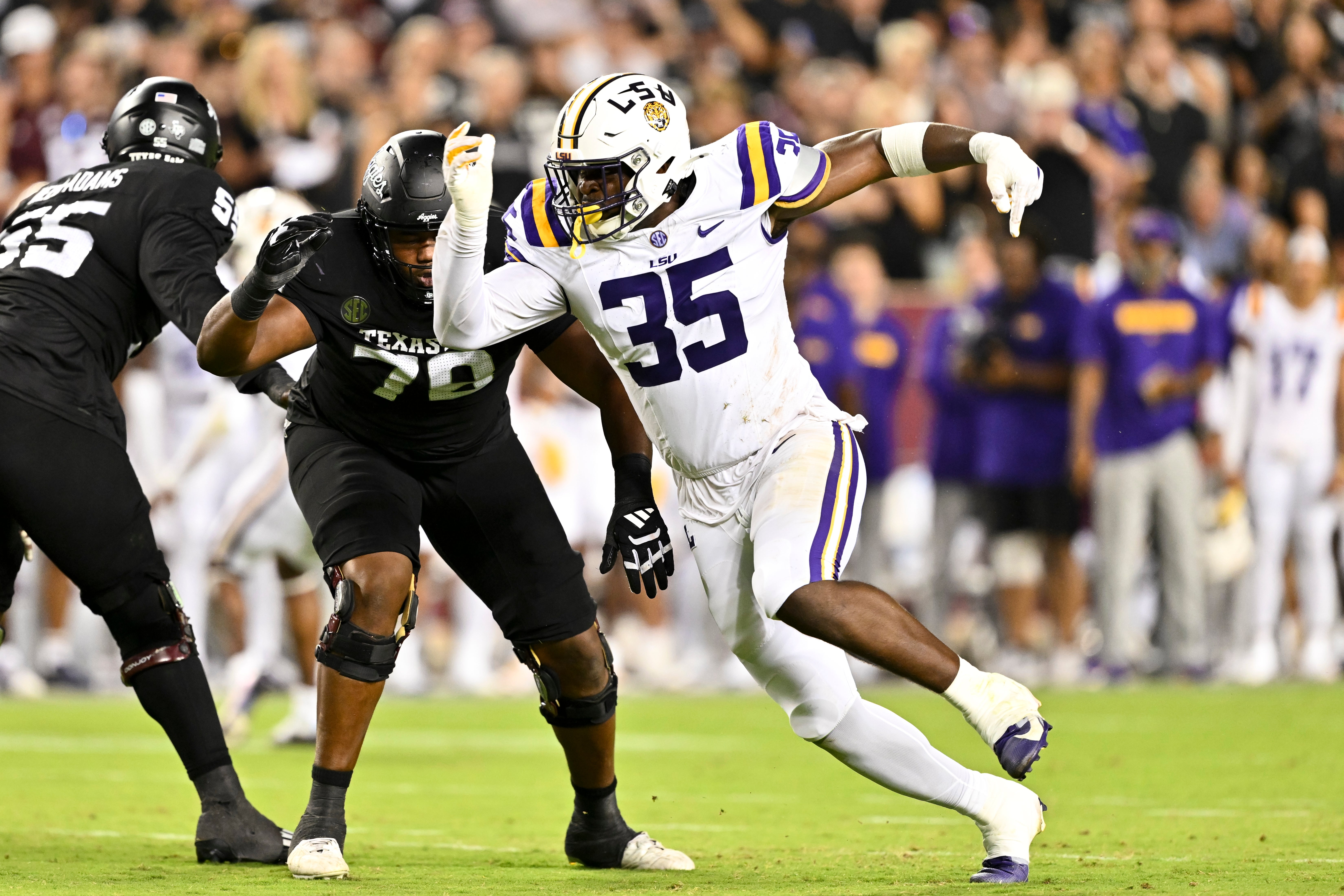 LSU Tigers defensive end Sai'vion Jones (35) defends in coverage during the third quarter against the Texas A&M Aggies.