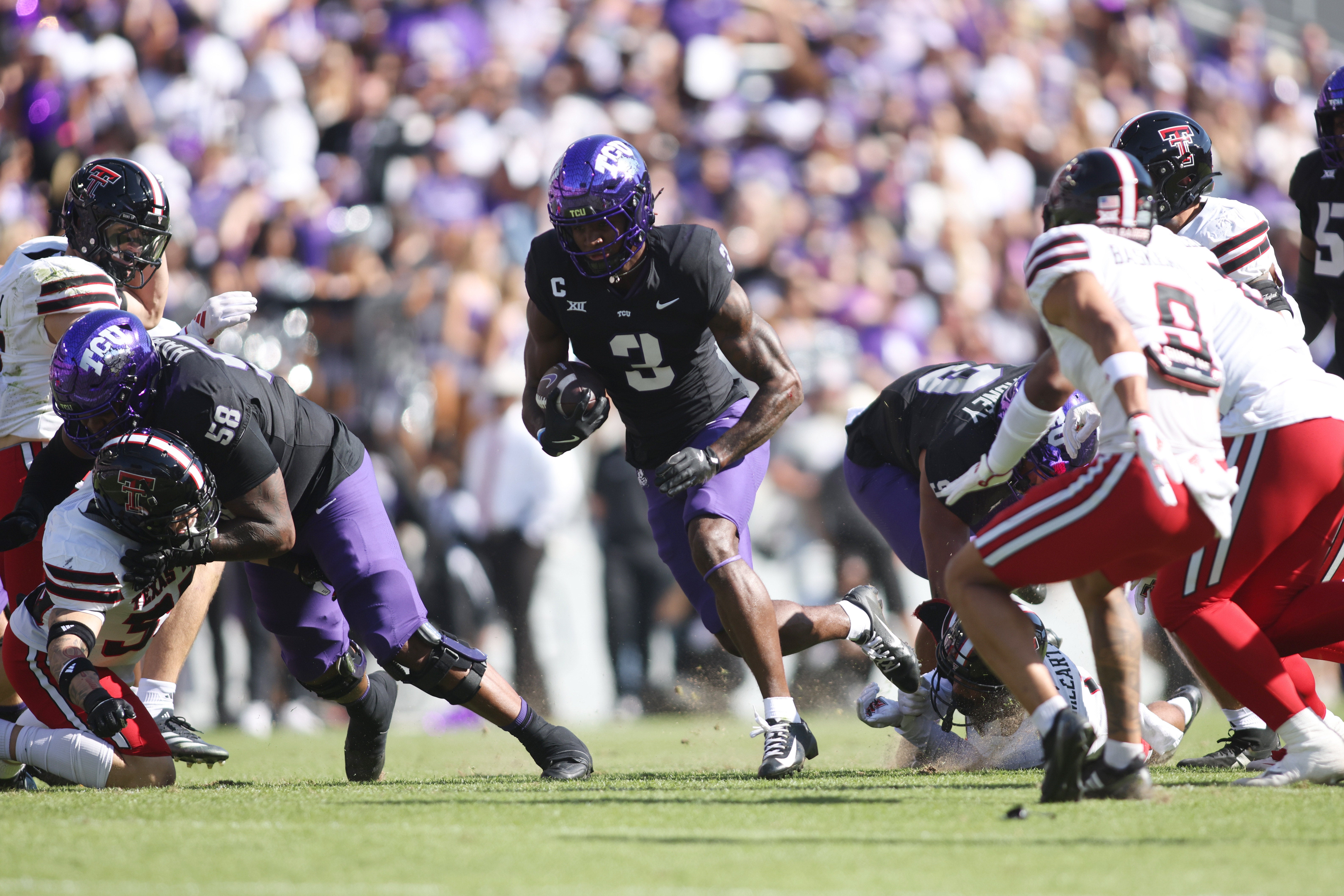 TCU Horned Frogs wide receiver Savion Williams (3) runs for a touchdown against the Texas Tech Red Raiders in the first quarter at Amon G. Carter Stadium.