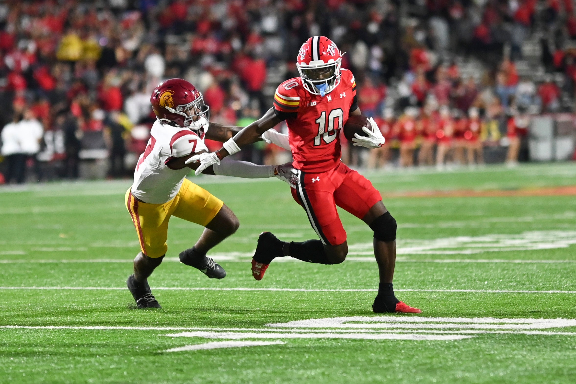 Oct 19, 2024; College Park, Maryland, USA; Maryland Terrapins wide receiver Tai Felton (10) runs by Southern California Trojans safety Kamari Ramsey (7) during the second half at SECU Stadium.