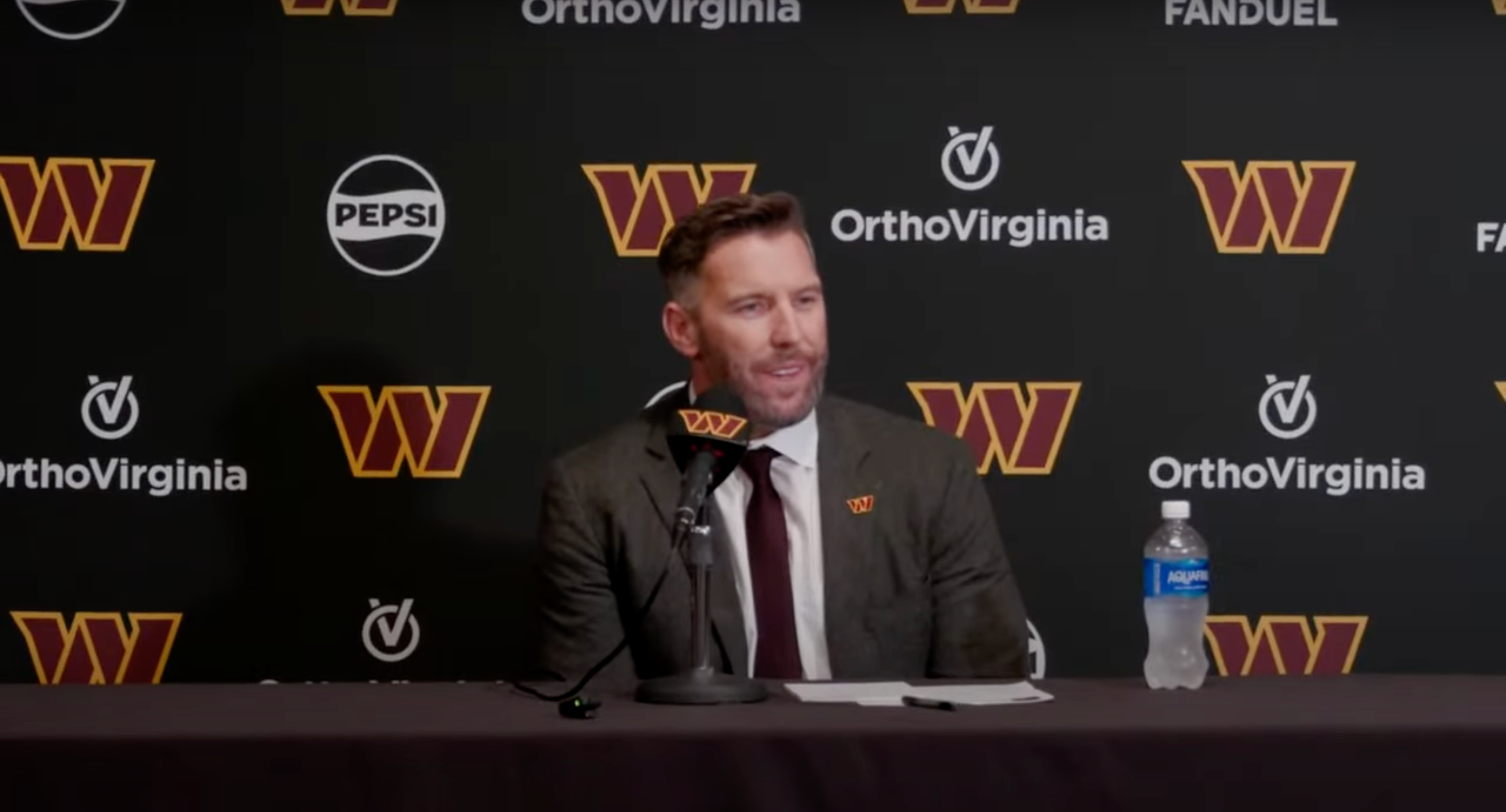 Adam Peters talks with reporters after Day 2 of the NFL Draft.