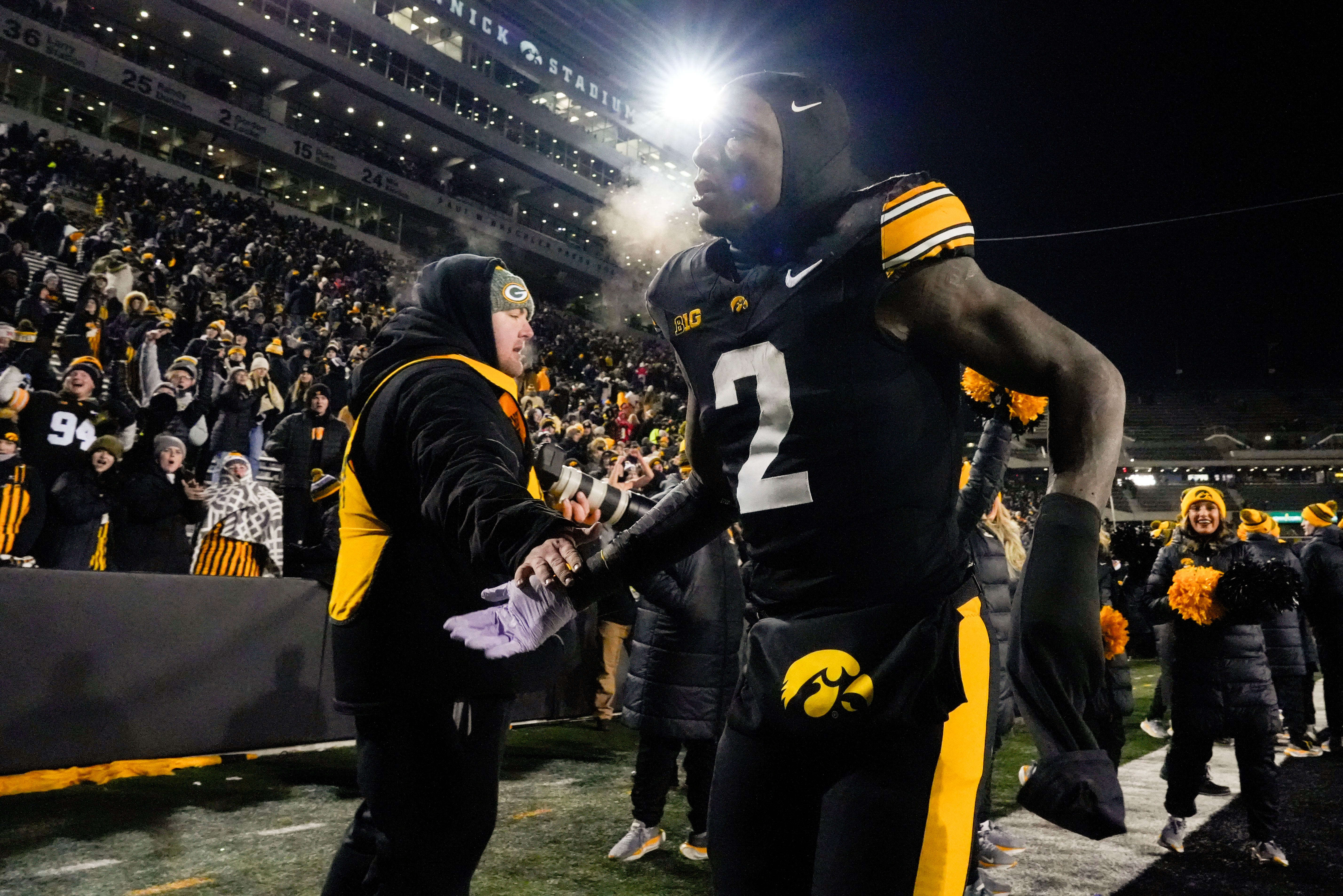 Iowa Hawkeyes running back Kaleb Johnson (2) runs off the field after the Hawkeyes defeated the Nebraska Cornhuskers 13-10 Friday, Nov. 29, 2024 at Kinnick Stadium in Iowa City, Iowa.