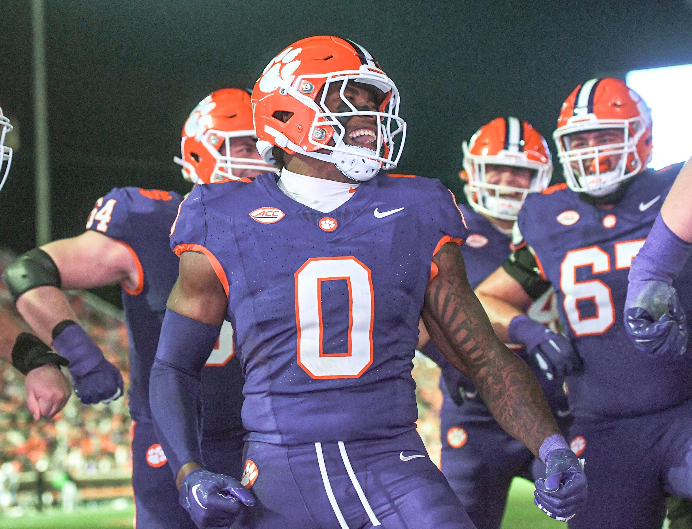 Nov 23, 2024; Clemson, South Carolina, USA; Clemson Tigers linebacker Barrett Carter (0) celebrates after scoring a touchdown against The Citadel Bulldogs during the fourth quarter at Memorial Stadium.