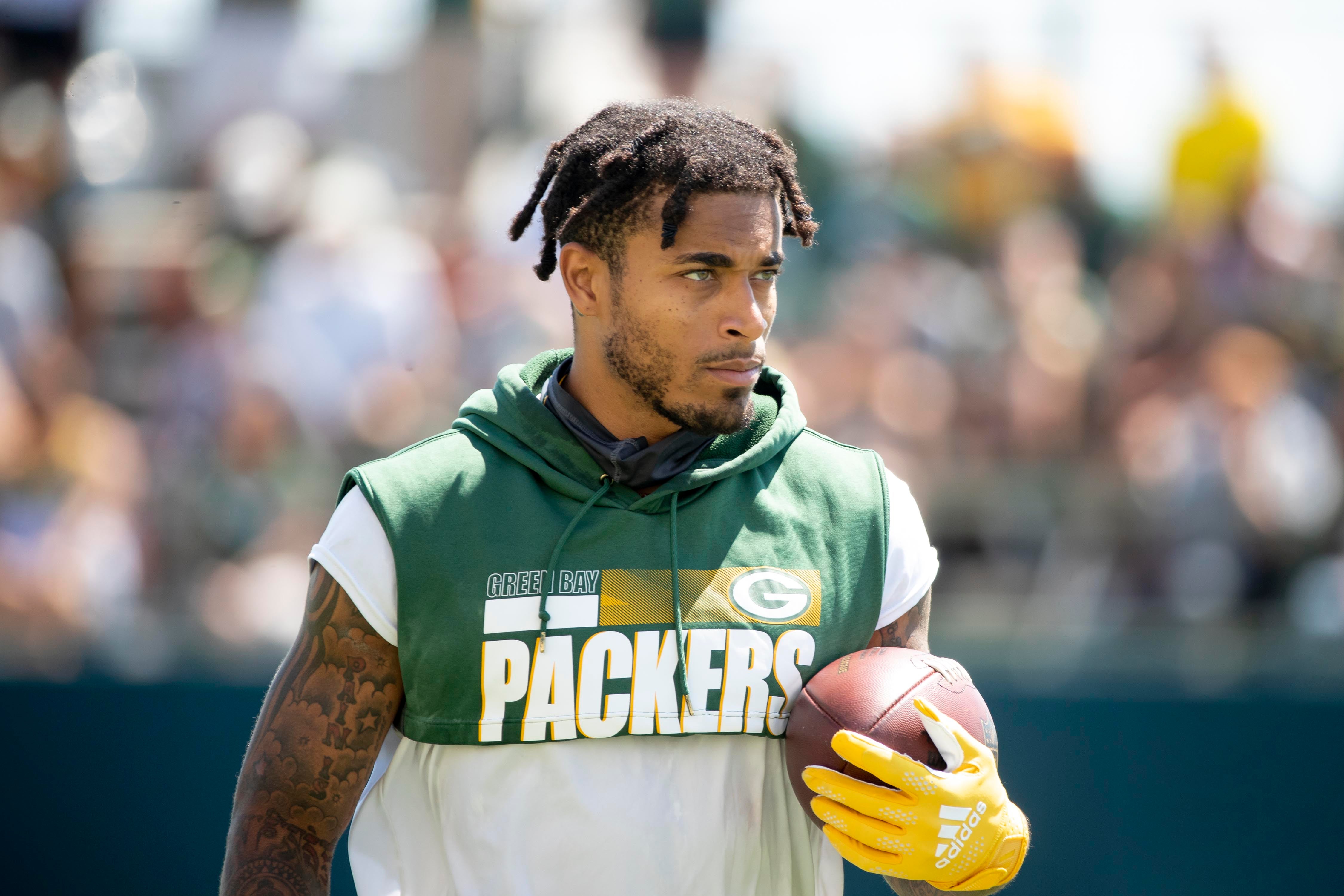 Green Bay Packers cornerback Jaire Alexander (23) walks off the field during training camp on Tuesday, Aug. 2, 2022, at Ray Nitschke Field in Ashwaubenon, Wis.