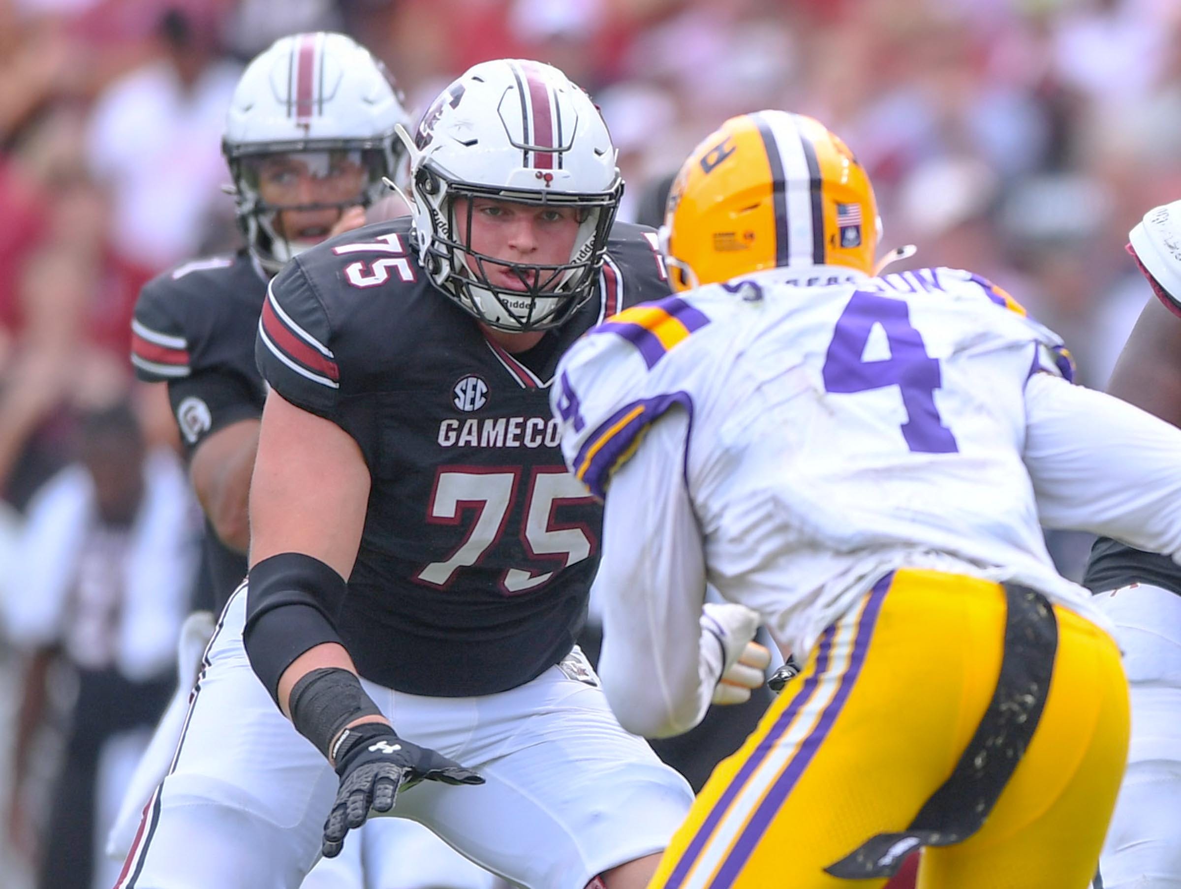 South Carolina offensive lineman Cason Henry (75) blocks Louisiana State University defensive end Bradyn Swinson (4) during the third quarter at Williams-Brice Stadium in Columbia, S.C. Saturday, September 14, 2024.