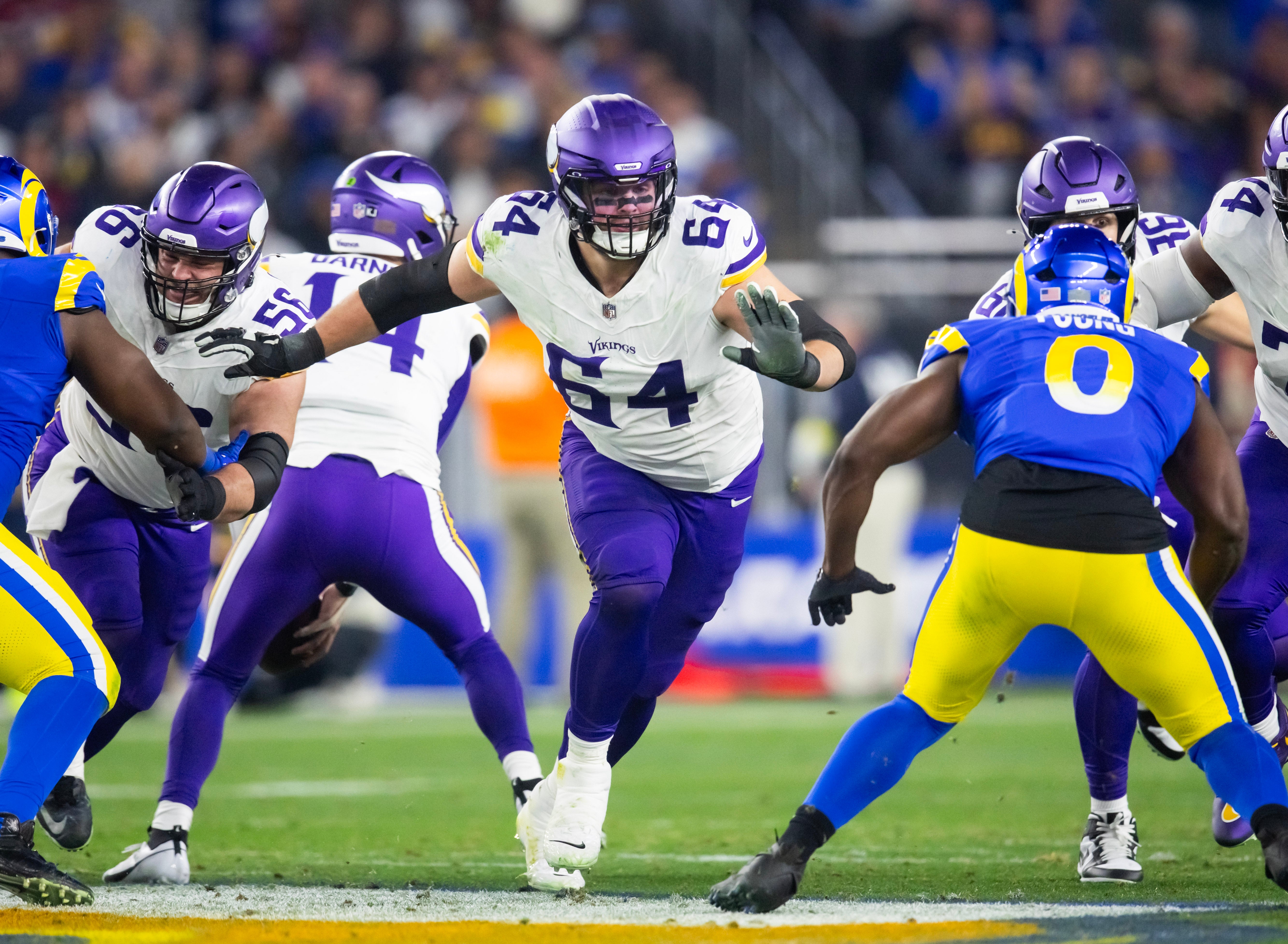 Jan 13, 2025; Glendale, AZ, USA; Minnesota Vikings guard Blake Brandel (64) against the Los Angeles Rams during an NFC wild card game at State Farm Stadium.