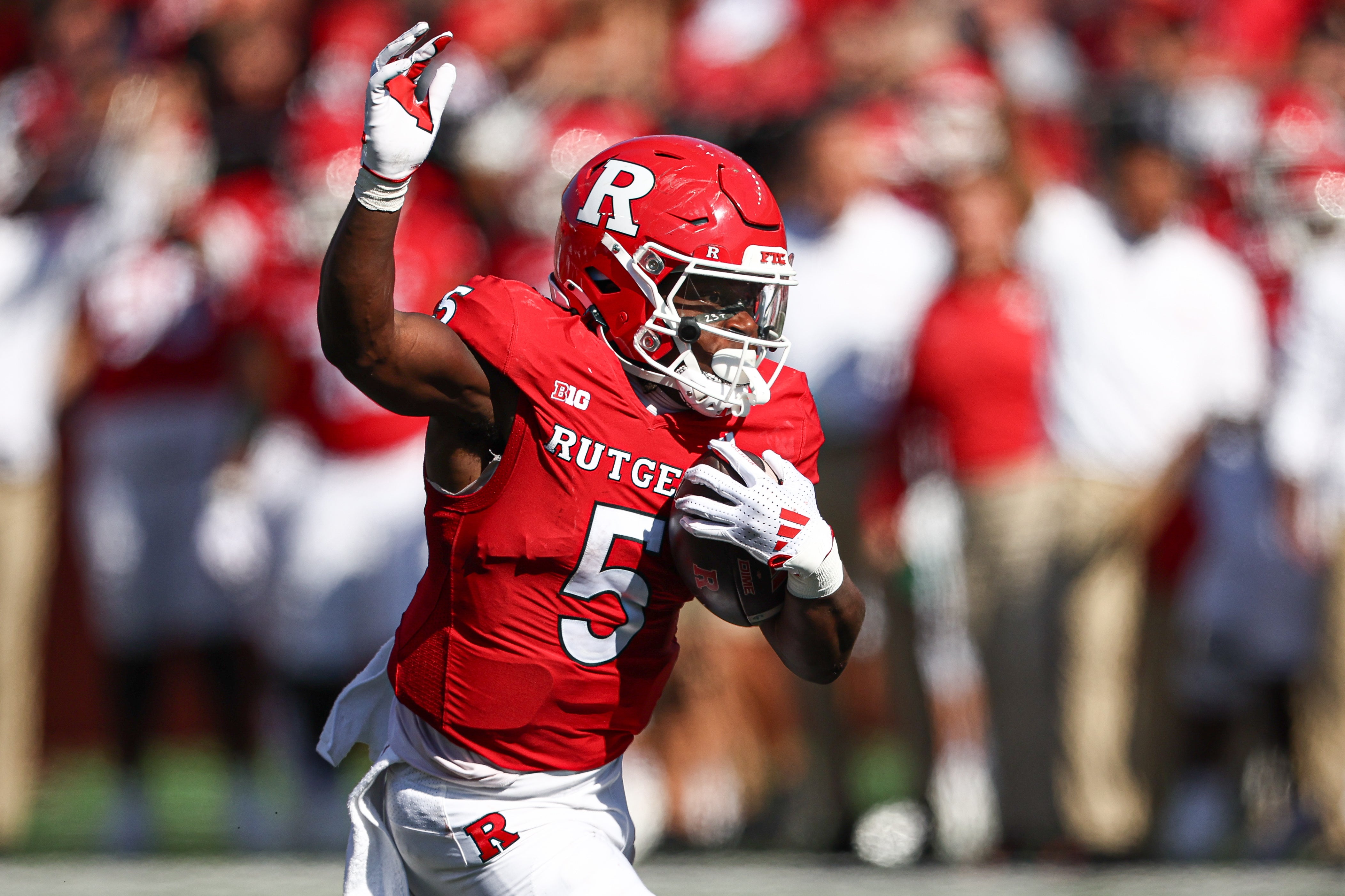 Oct 19, 2024; Piscataway, New Jersey, USA; Rutgers Scarlet Knights running back Kyle Monangai (5) carries the ball against the UCLA Bruins during the second half at SHI Stadium.