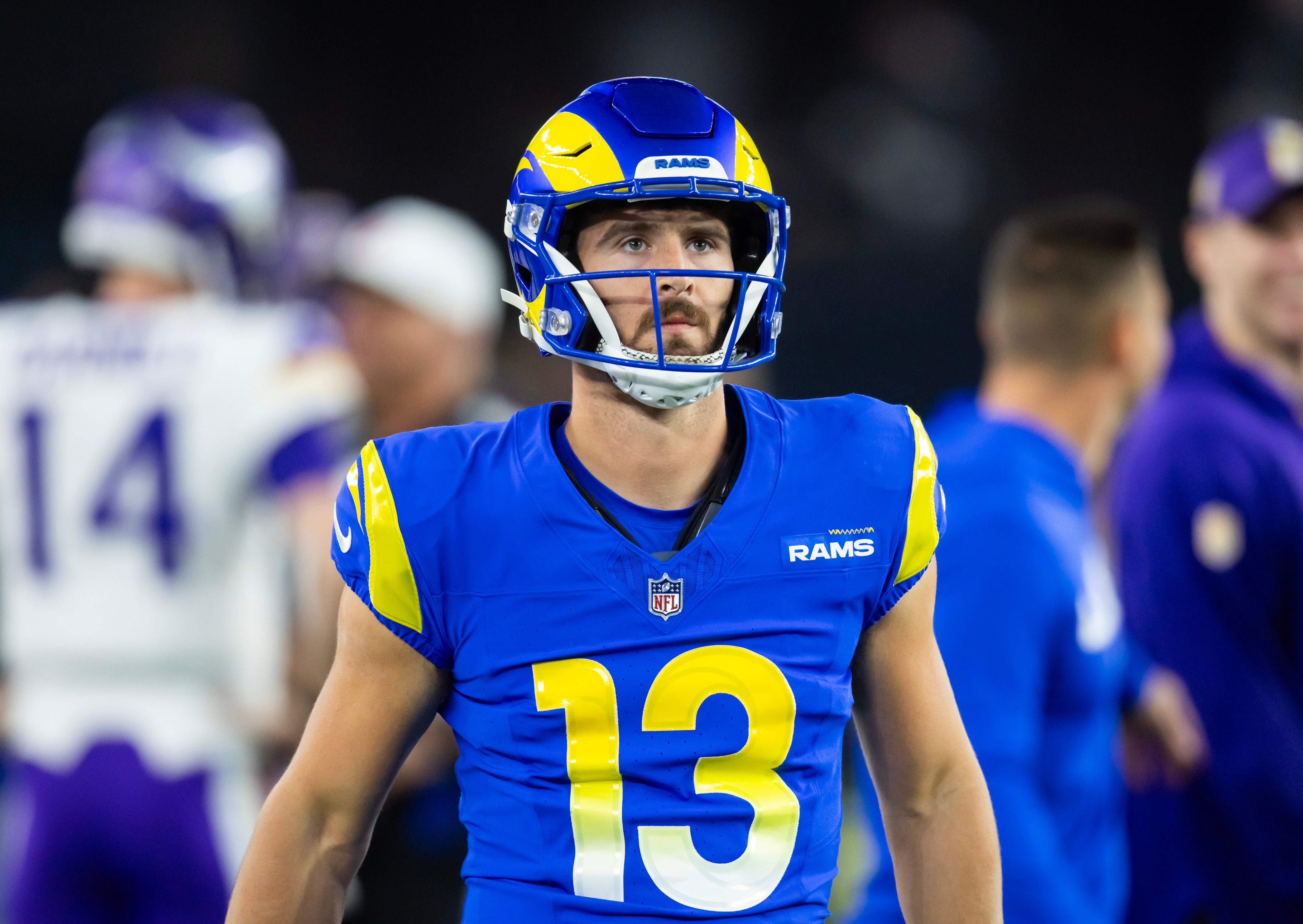 Jan 13, 2025; Glendale, AZ, USA; Los Angeles Rams quarterback Stetson Bennett (13) against the Minnesota Vikings during an NFC wild card game at State Farm Stadium.