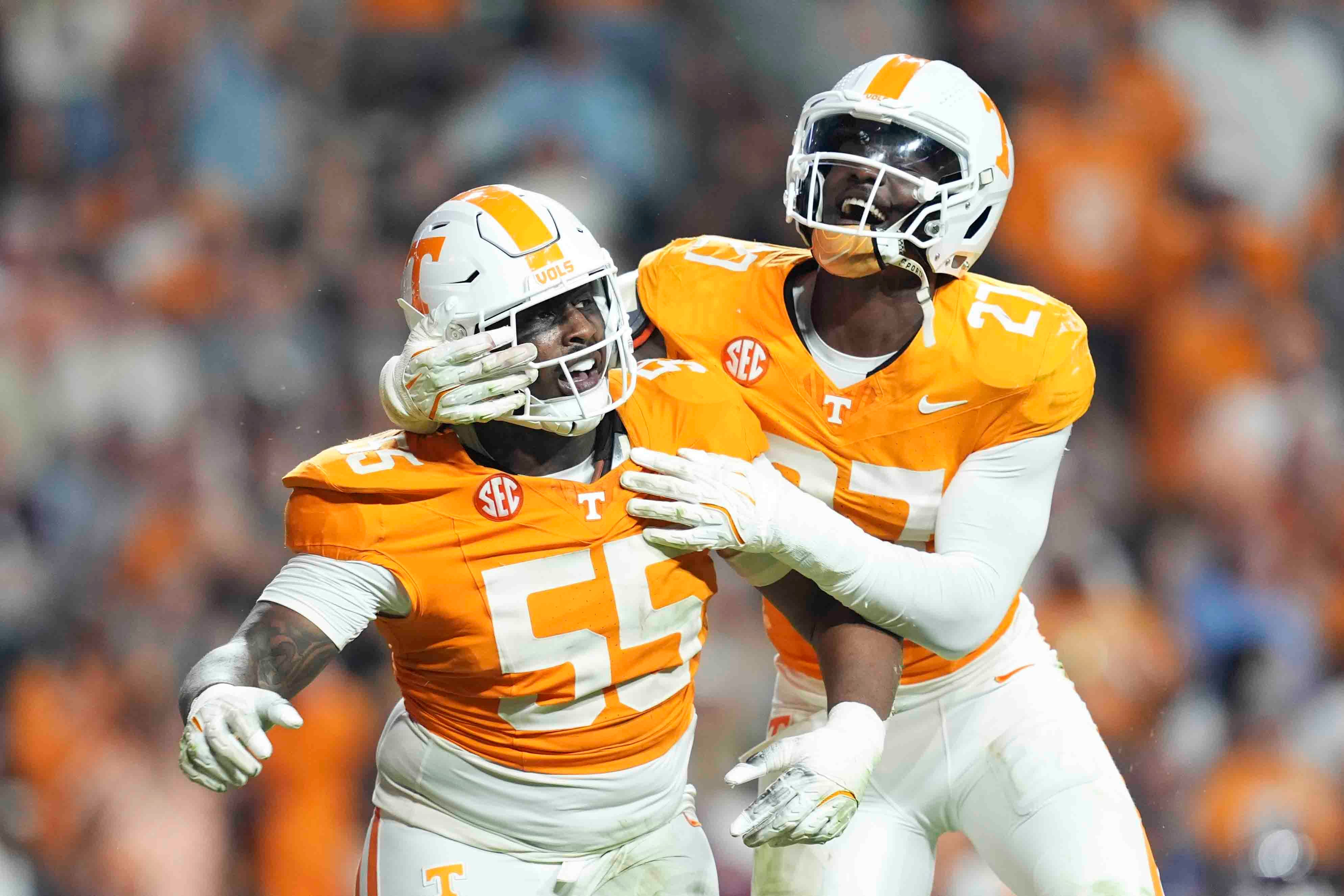 Nov 9, 2024; Knoxville, Tennessee, USA; Tennessee Volunteers defensive lineman Omarr Norman-Lott (55) celebrates with defensive lineman James Pearce Jr. (27) after recording a sack against the Mississippi State Bulldogs during the second half at Neyland Stadium.