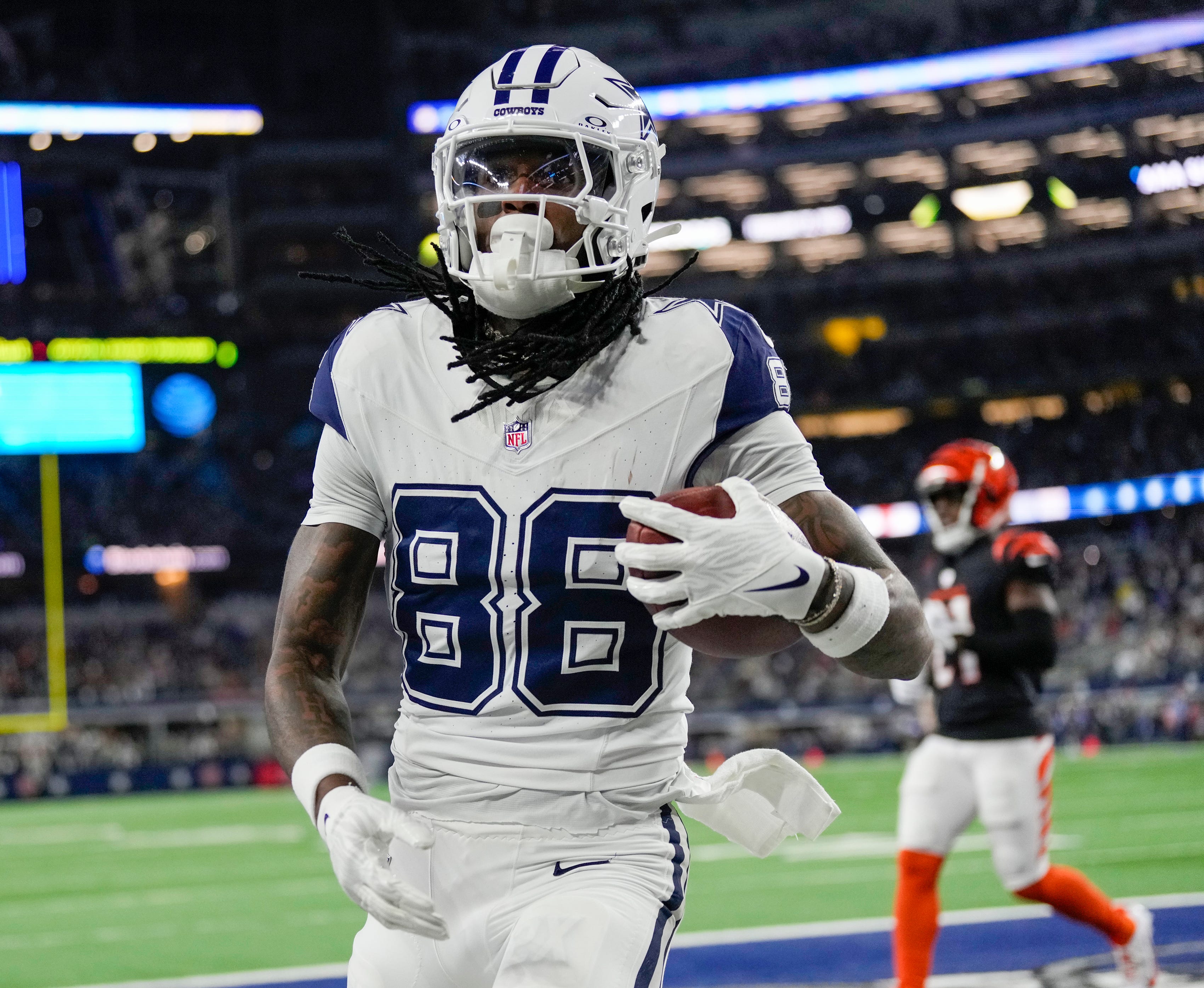 Dallas Cowboys wide receiver CeeDee Lamb (88) makes a touchdown over the Cincinnati Bengals in the first quarter during Monday Night Football at AT&T Stadium in Arlington, Texas on Monday, December 9, 2024.