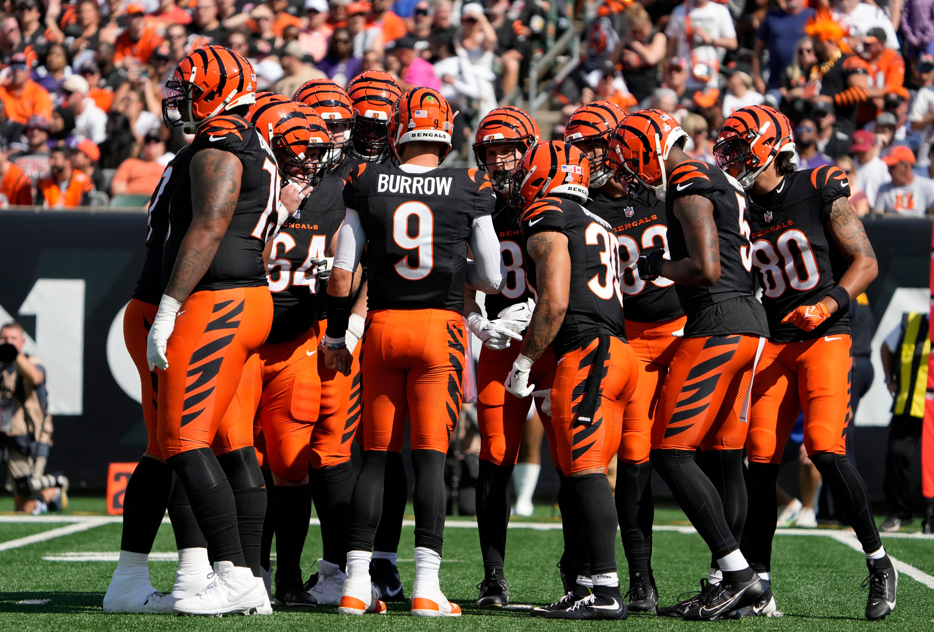 The Cincinnati Bengals quarterback Joe Burrow and the Bengals offensive huddle as they face the Baltimore Ravens Sunday October 6, 2024 at Payor Stadium.
