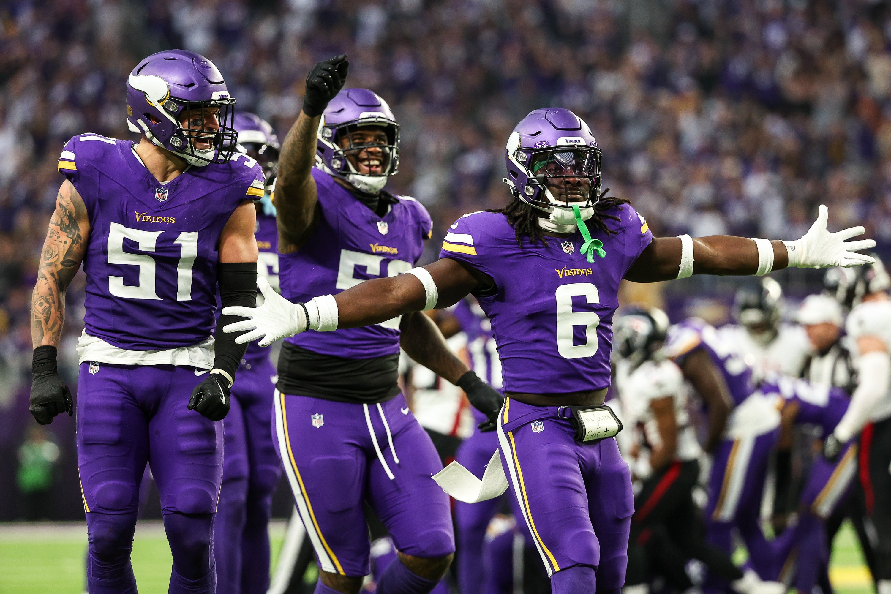 Dec 8, 2024; Minneapolis, Minnesota, USA; Minnesota Vikings linebacker Brian Asamoah II (6) celebrates his teams fumble recovery against the Atlanta Falcons during the fourth quarter at U.S. Bank Stadium.