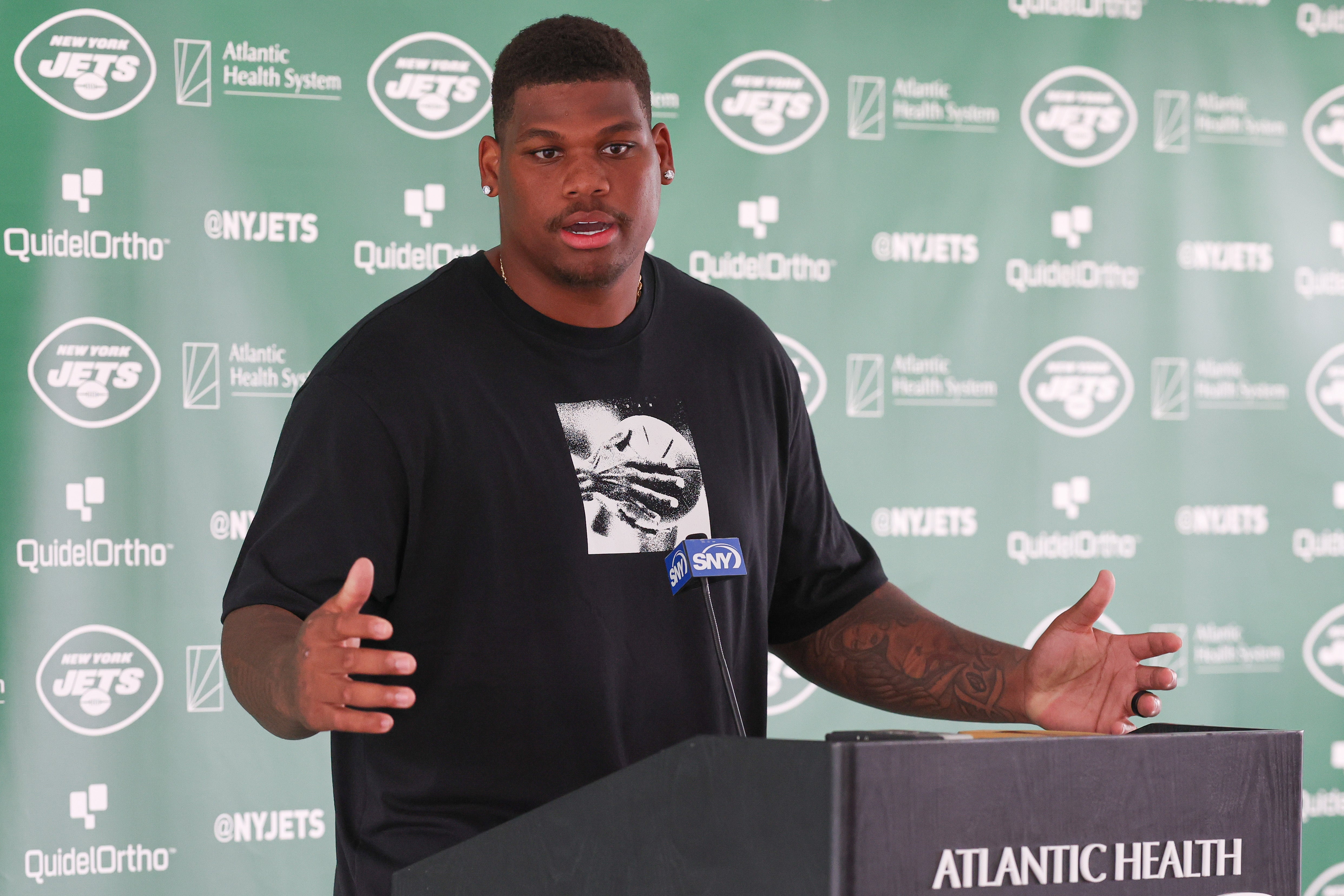 New York Jets defensive tackle Quinnen Williams (95) talks with media during the New York Jets Training Camp at Atlantic Health Jets Training Center.