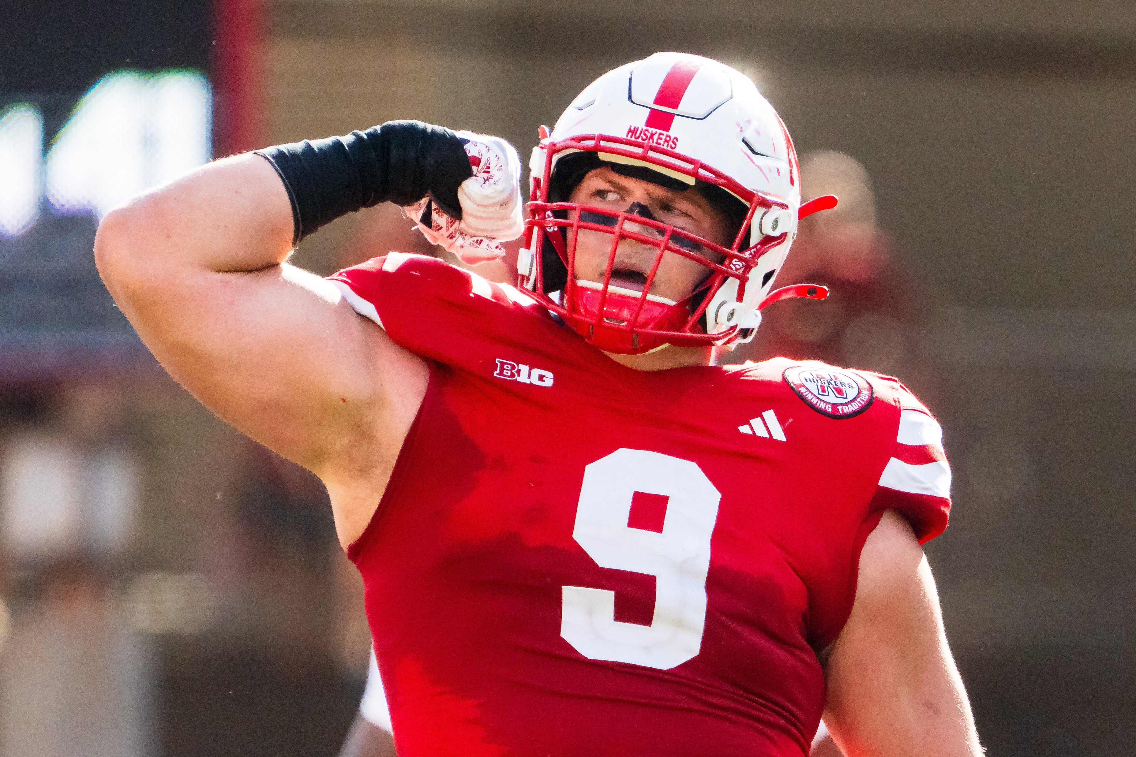 Nebraska Cornhuskers defensive lineman Ty Robinson (9) celebrates after a sack against the Rutgers Scarlet Knights during the second quarter at Memorial Stadium.