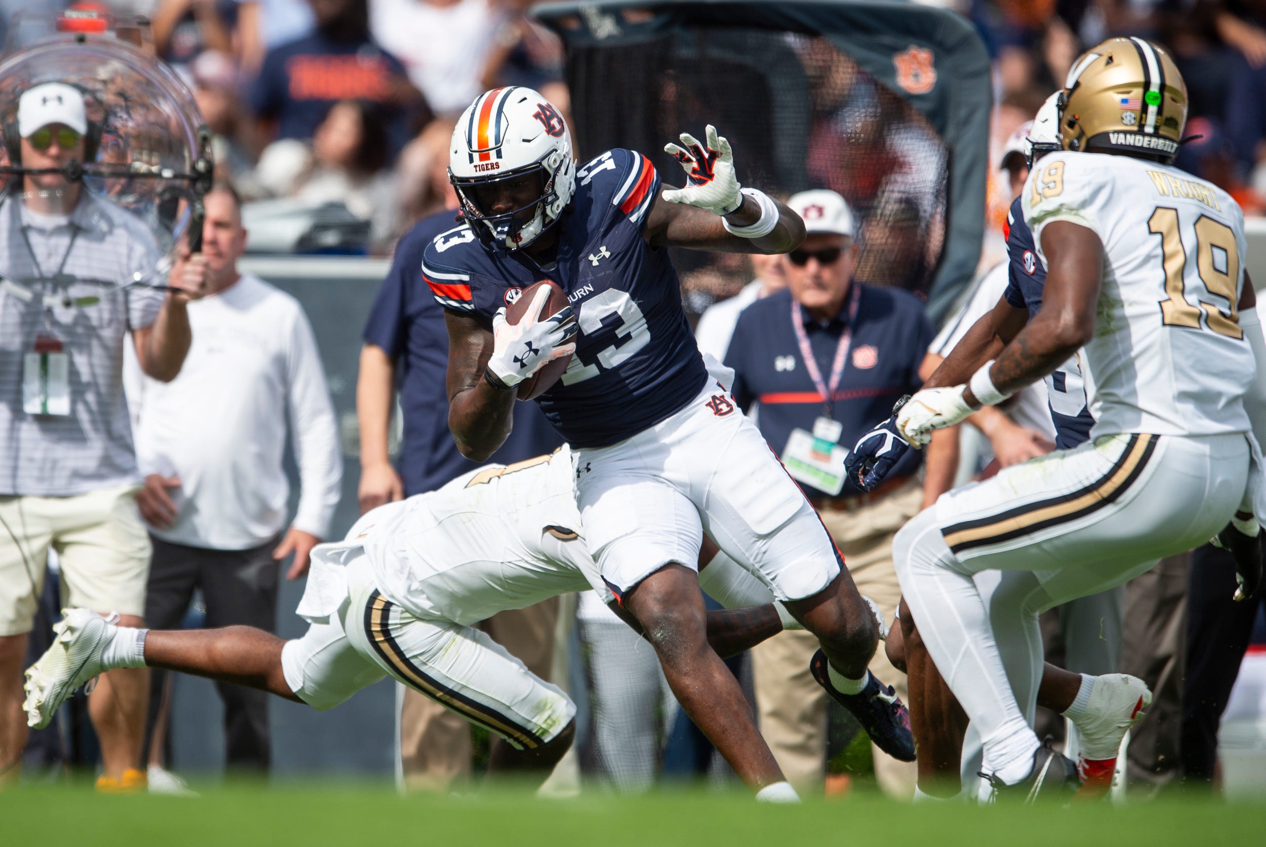 Auburn Tigers tight end Rivaldo Fairweather (13) turns upfield after a catch as Auburn Tigers take on Vanderbilt Commodores at Jordan-Hare Stadium in Auburn, Ala., on Saturday, Nov. 2, 2024. Auburn Tigers and Vanderbilt Commodores are tied 7-7 at halftime.
