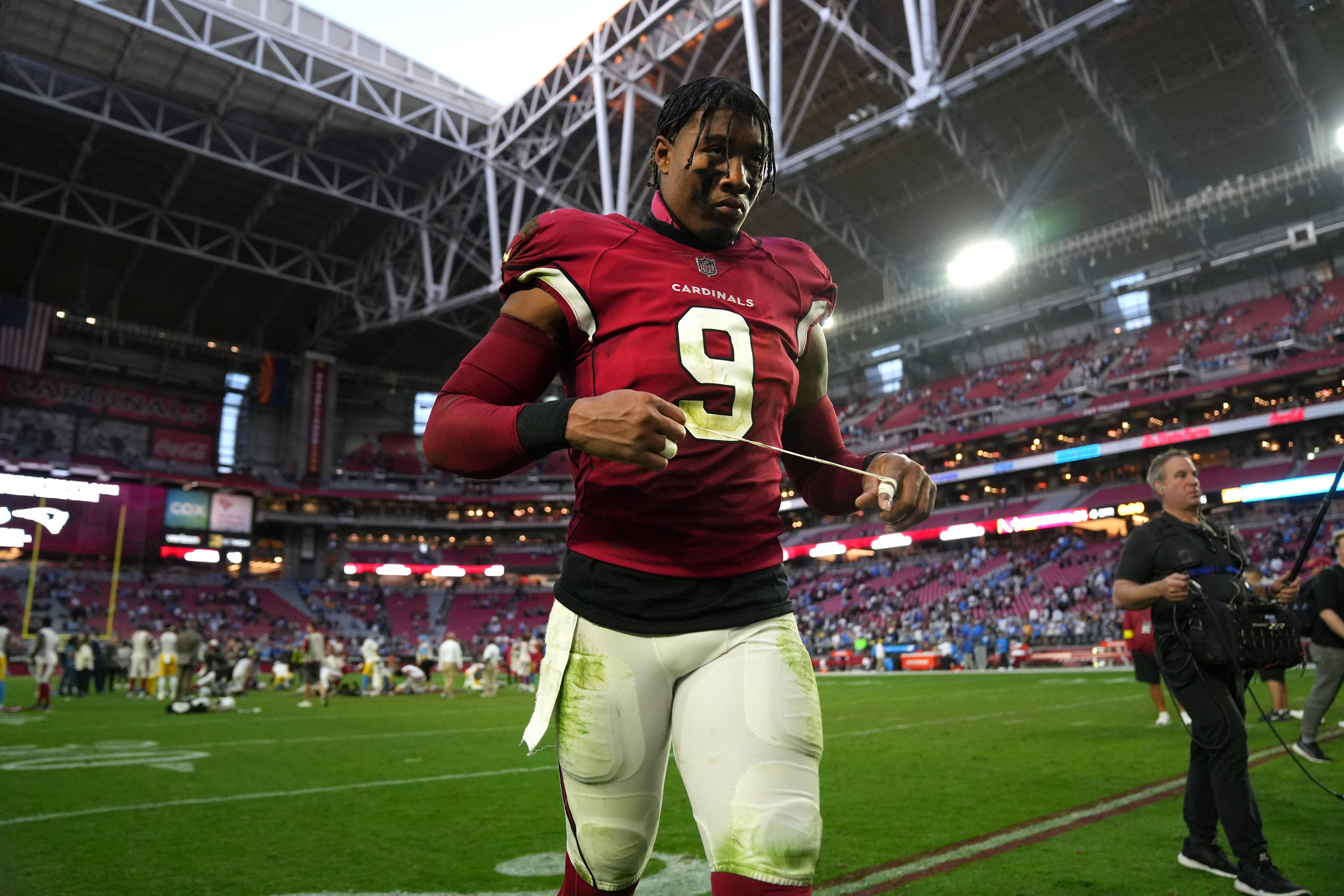 Arizona Cardinals linebacker Isaiah Simmons walks off the field after their 25-24 loss against the Los Angeles Chargers at State Farm Stadium in Los Angeles on Nov. 27, 2022. Nfl Arizona Cardinals Vs Los Angeles Chargers Los Angeles Chargers At Arizona Cardinals
