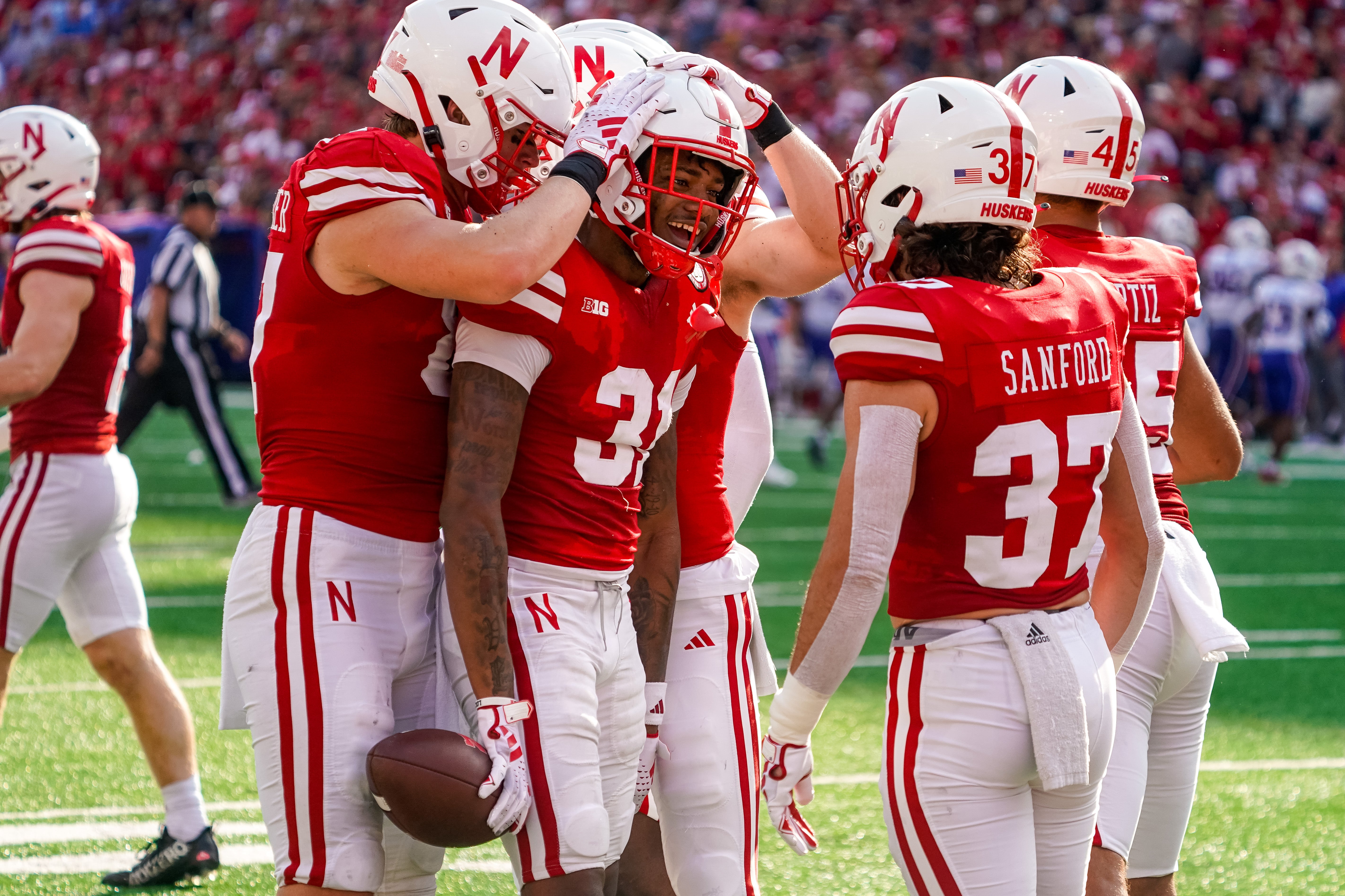 Sep 23, 2023; Lincoln, Nebraska, USA; Nebraska Cornhuskers defensive back Tommi Hill (31) celebrates with teammates after downing a punt inside the 5-yard line against the Louisiana Tech Bulldogs during the third quarter at Memorial Stadium.