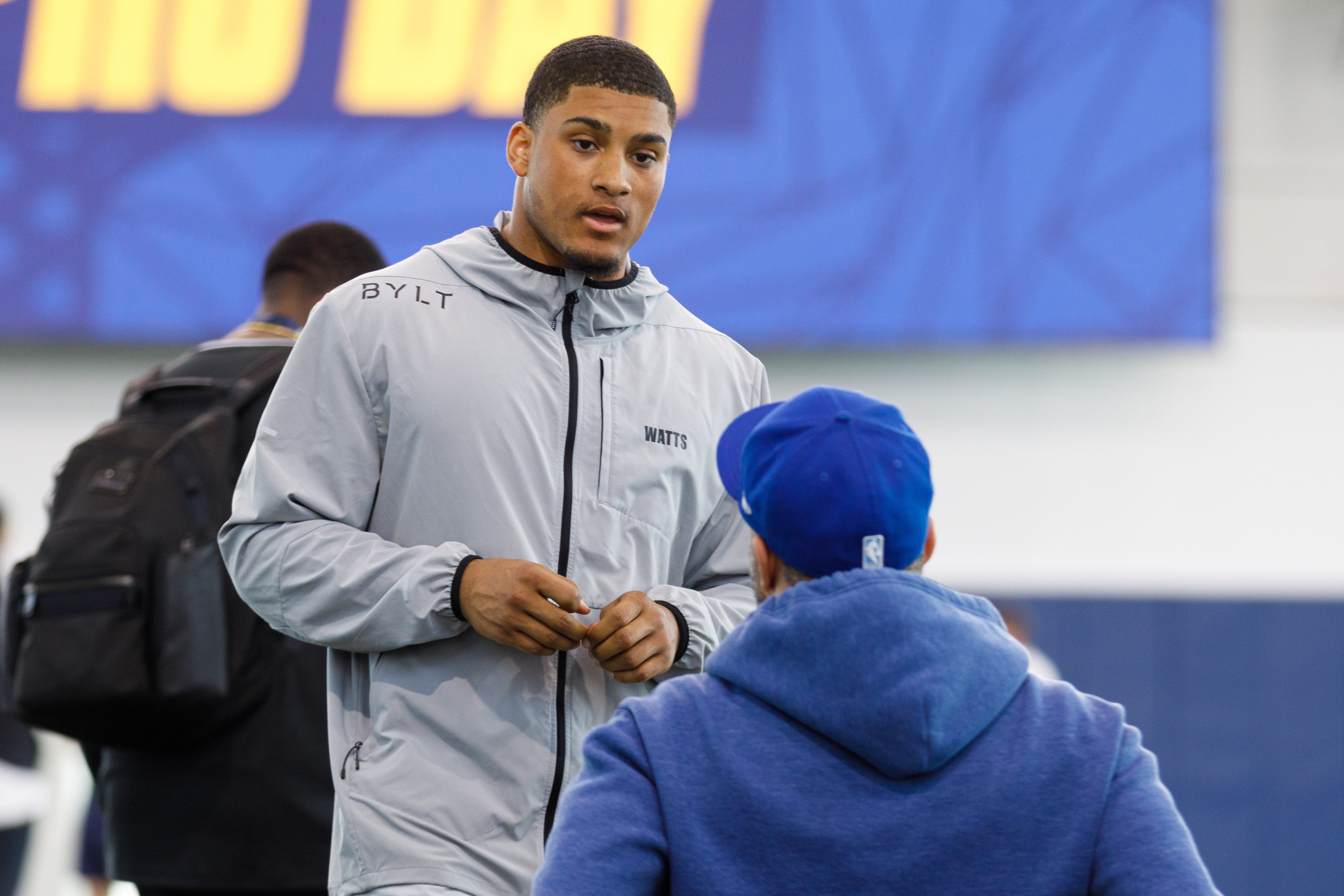Defensive back Xavier Watts, left, speaks with his father Jeff Watts during Notre Dame football's Pro Day at Irish Athletic Center on Thursday, March 27, 2025, in South Bend.