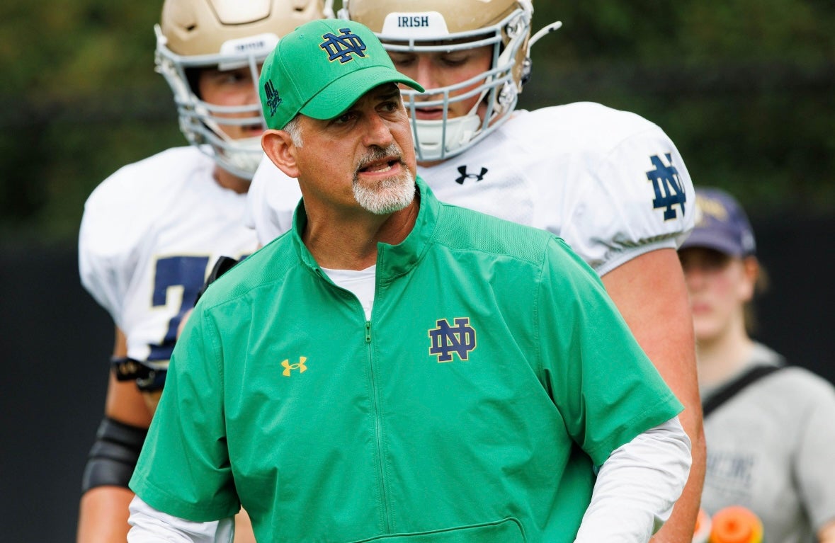 Notre Dame offensive lineman coach Joe Rudolph talks through a drill during a Notre Dame football practice at Irish Athletic Center on Tuesday, Aug. 6, 2024, in South Bend.
