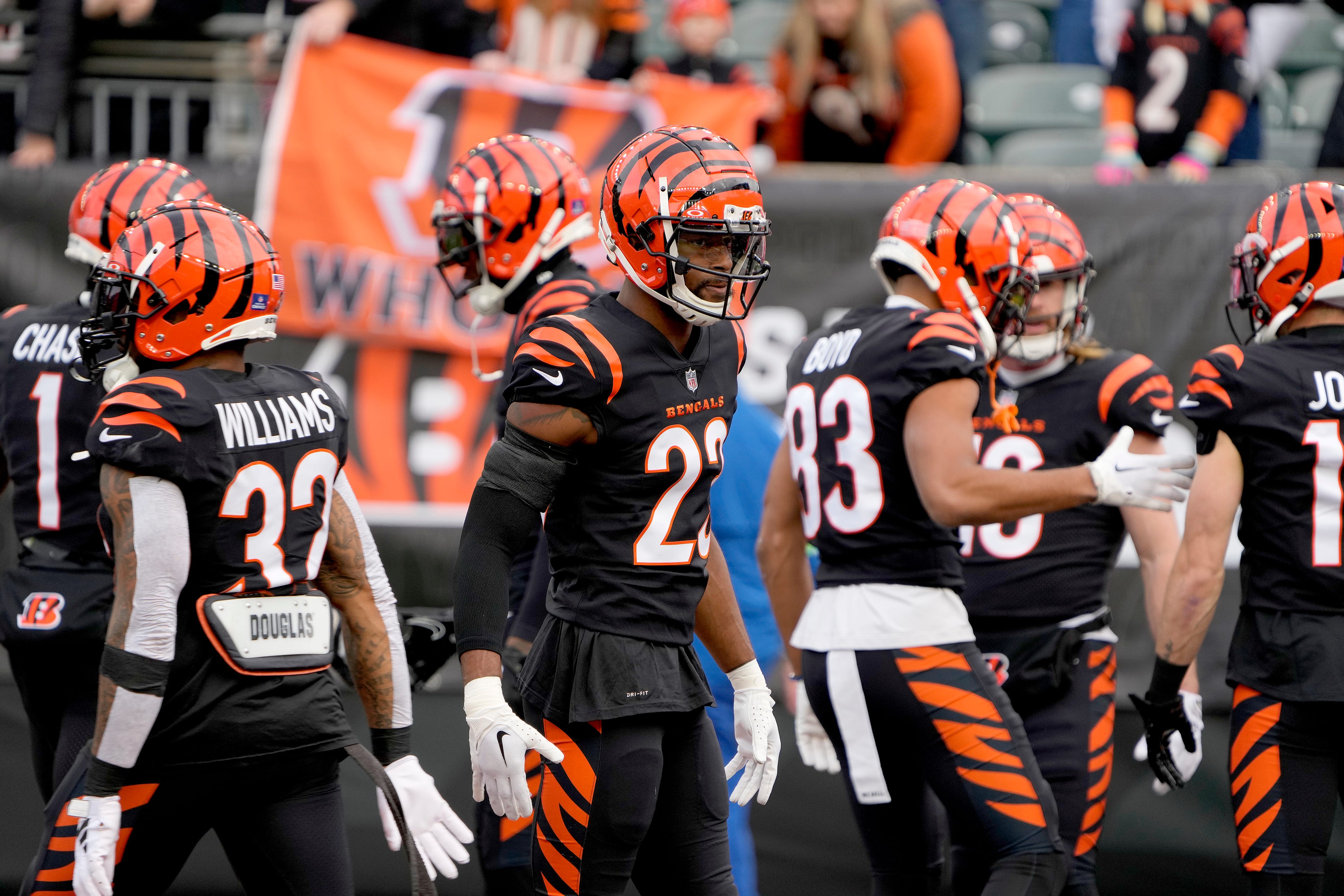Cincinnati Bengals safety Dax Hill (23) and his teammates take the field for warm ups before facing the Minnesota Vikings at Paycor Stadium Saturday, December 16, 2023.