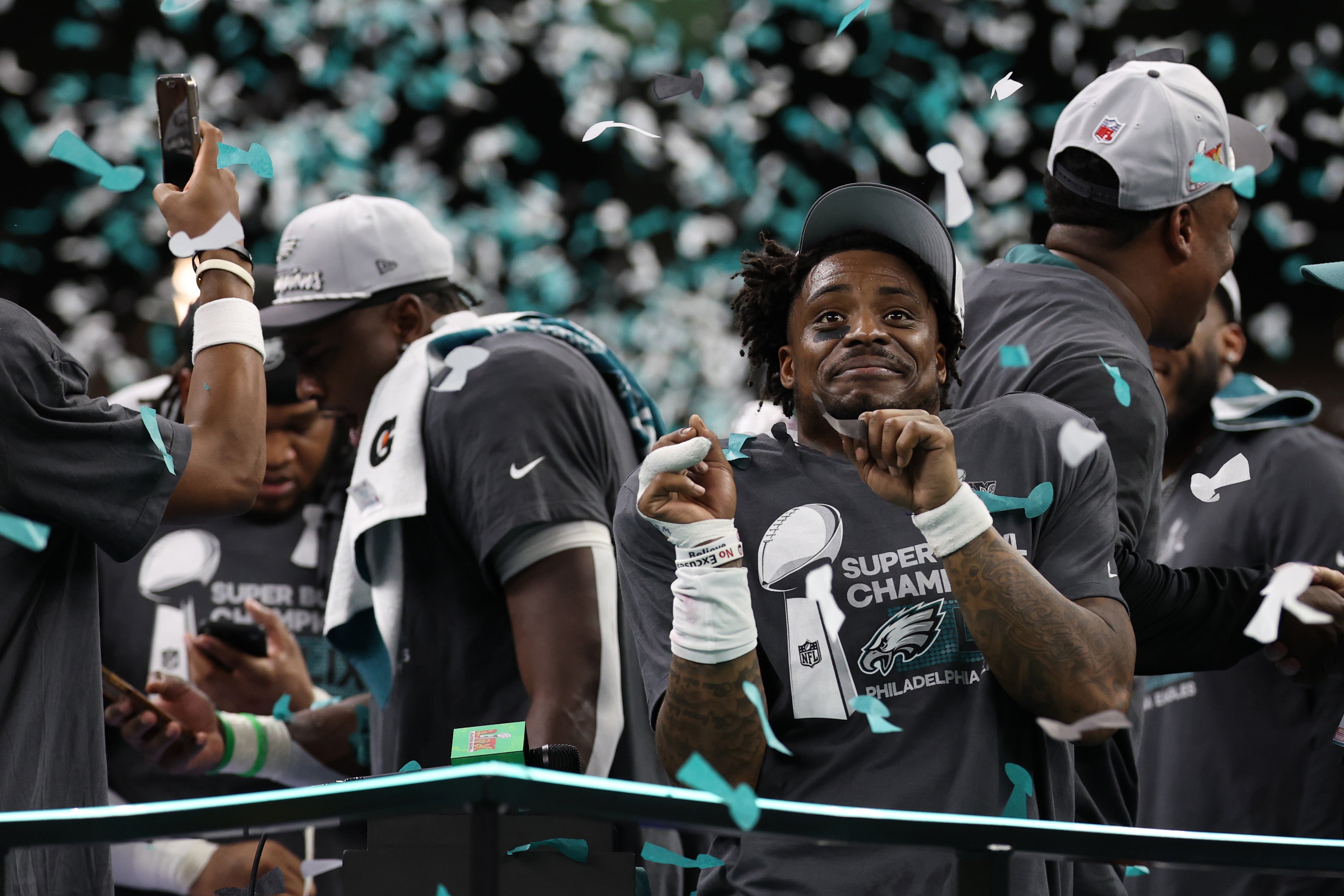 Philadelphia Eagles safety C.J. Gardner-Johnson celebrates on the stage during the championship trophy presentation after the Eagles' game against the Kansas City Chiefs in Super Bowl LIX at Caesars