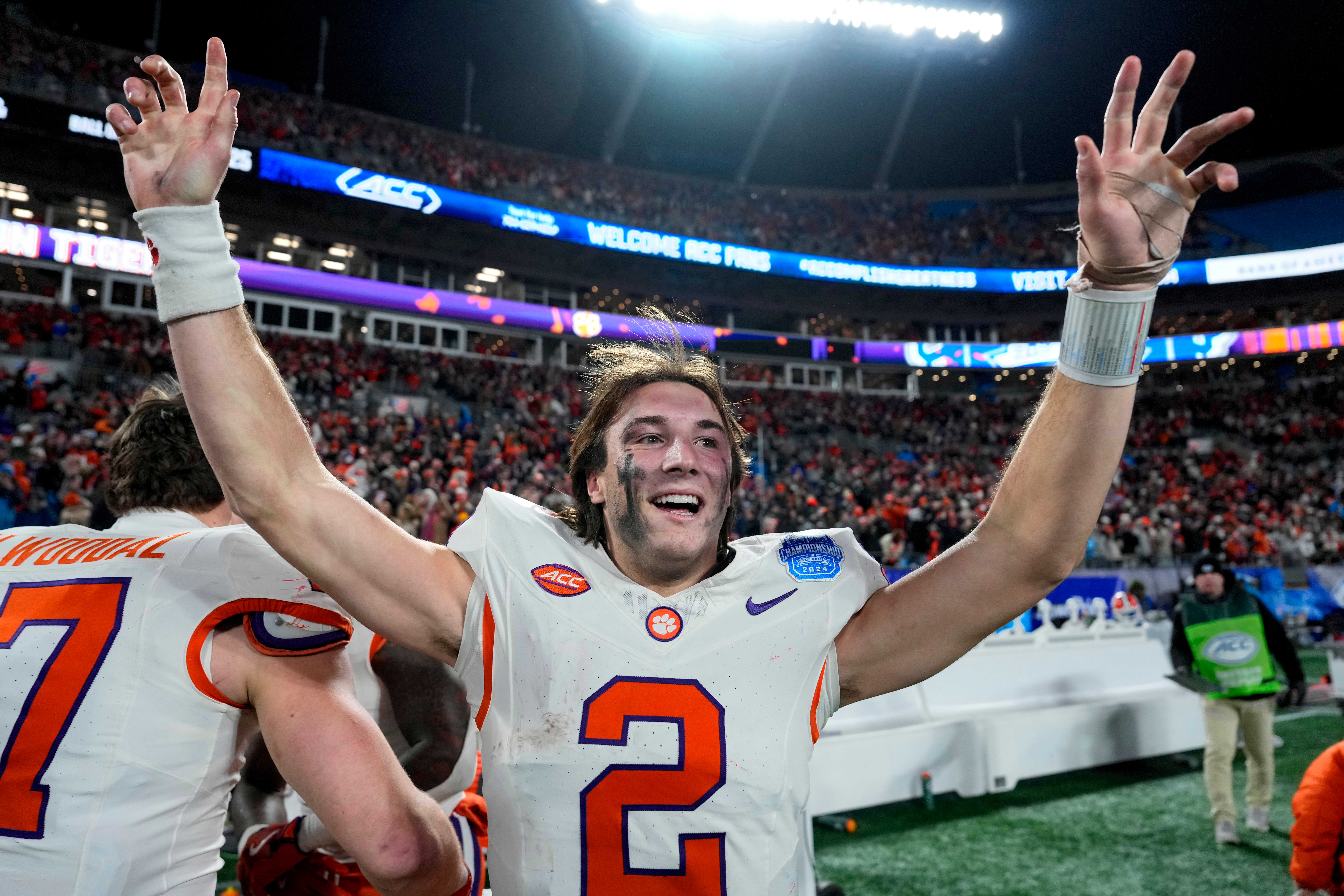 Dec 7, 2024; Charlotte, NC, USA; Clemson Tigers quarterback Cade Klubnik (2) celebrates after defeating the Southern Methodist Mustangs in the 2024 ACC Championship game at Bank of America Stadium.