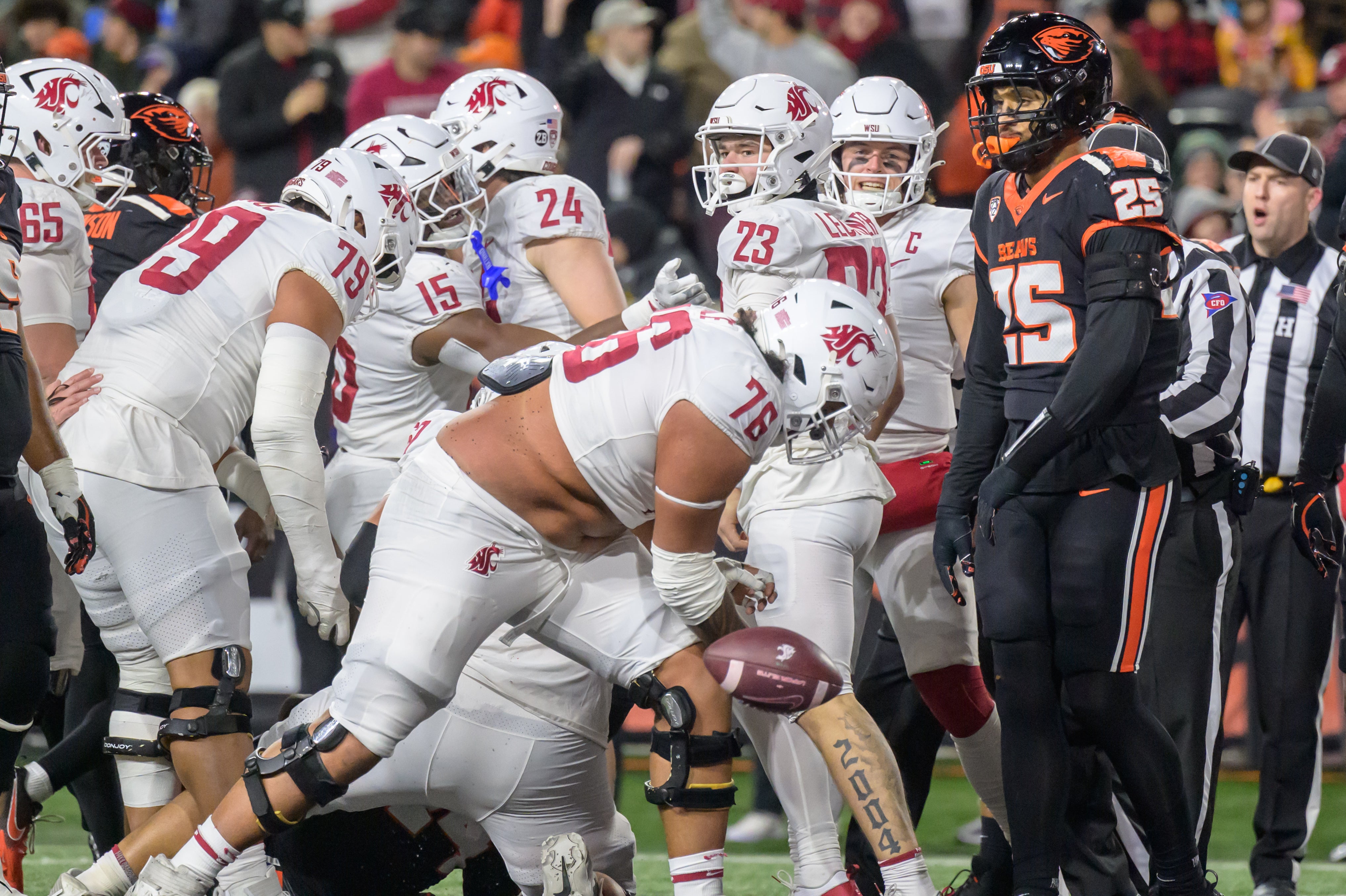 Nov 23, 2024; Corvallis, Oregon, USA; Washington State Cougars offensive lineman Esa Pole (76) spikes the football during a touchdown celebration during the second quarter against the Oregon State Beavers at Reser Stadium.