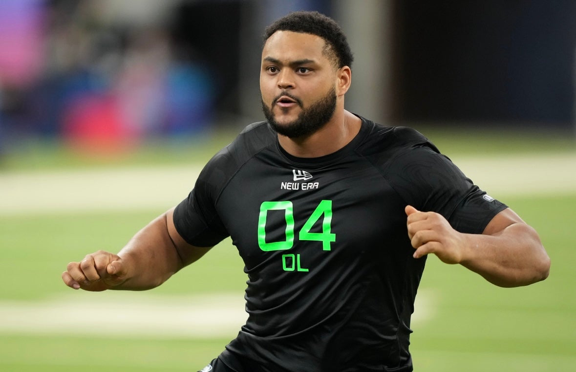 Mar 2, 2025; Indianapolis, IN, USA; Kansas offensive lineman Logan Brown (OL04) during the 2025 NFL Combine at Lucas Oil Stadium. Mandatory Credit: Kirby Lee-Imagn Images