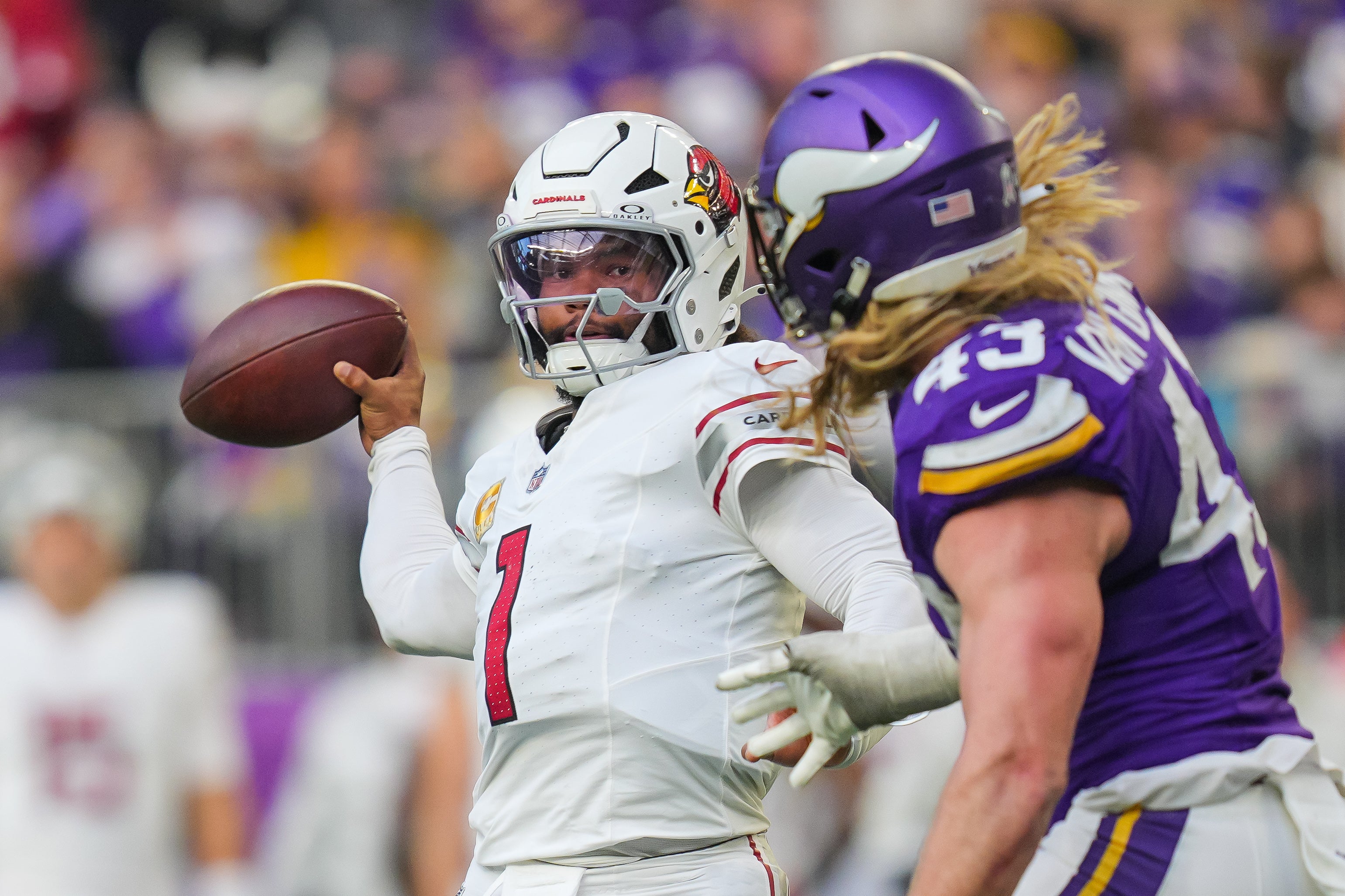 Dec 1, 2024; Minneapolis, Minnesota, USA; Arizona Cardinals quarterback Kyler Murray (1) passes against the Minnesota Vikings linebacker Andrew Van Ginkel (43) in the fourth quarter at U.S. Bank Stadium.