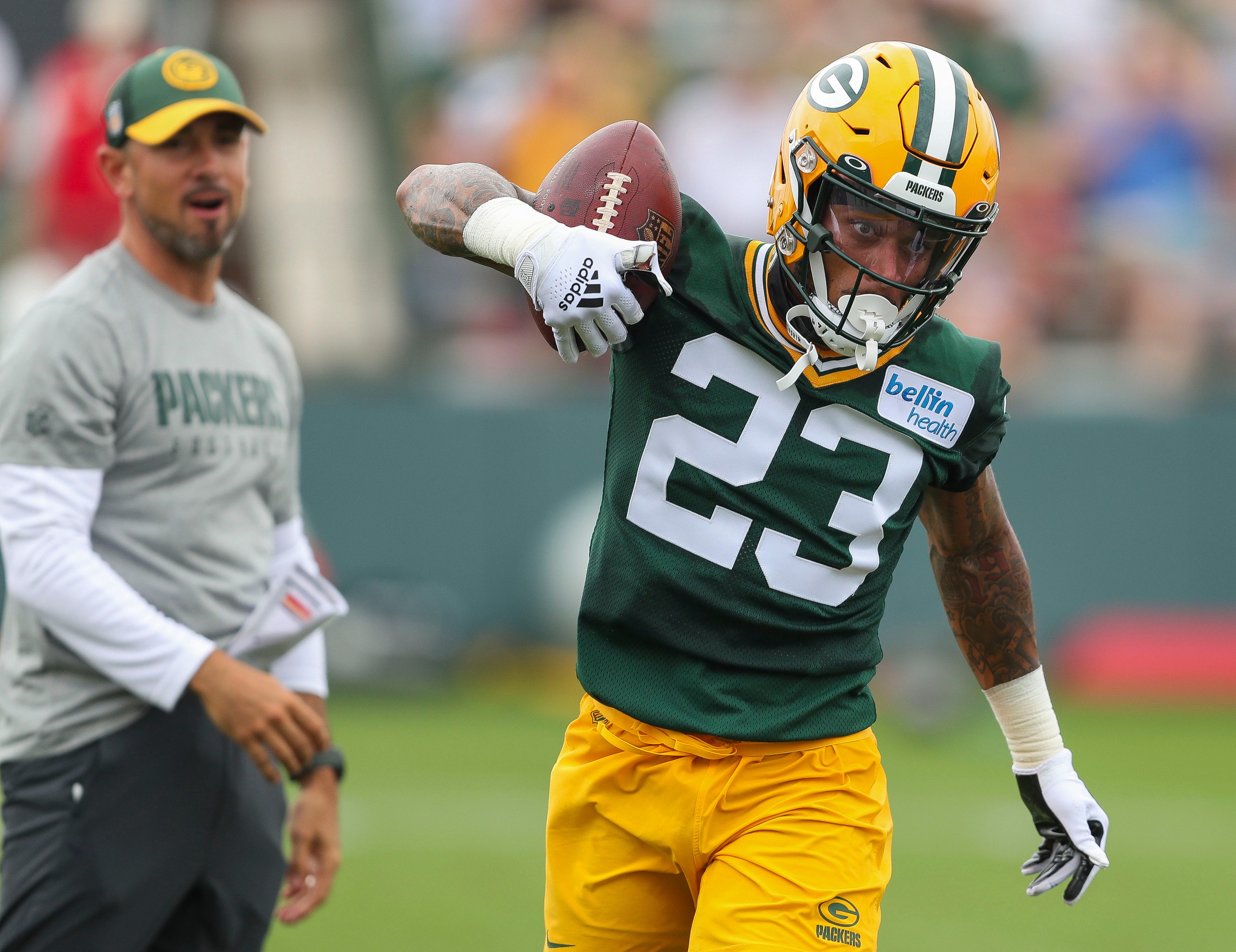 Green Bay Packers cornerback Jaire Alexander (23) runs through positional drills during the first day of training camp on Wednesday, July 26, 2023, at Ray Nitschke Field in Green Bay