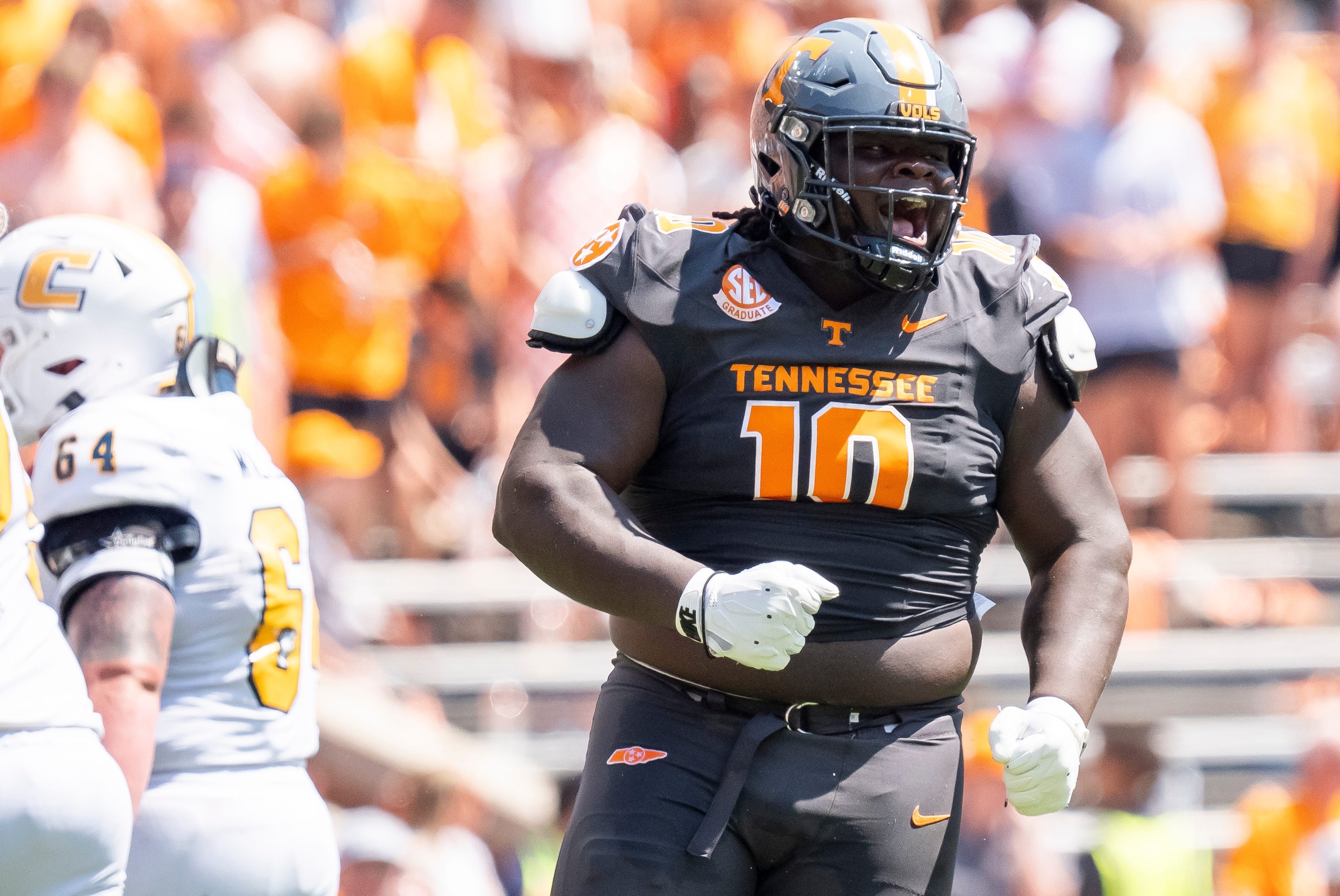 Elijah Simmons, Tennessee Vols defensive lineman celebrates a play against UT Chattanooga.