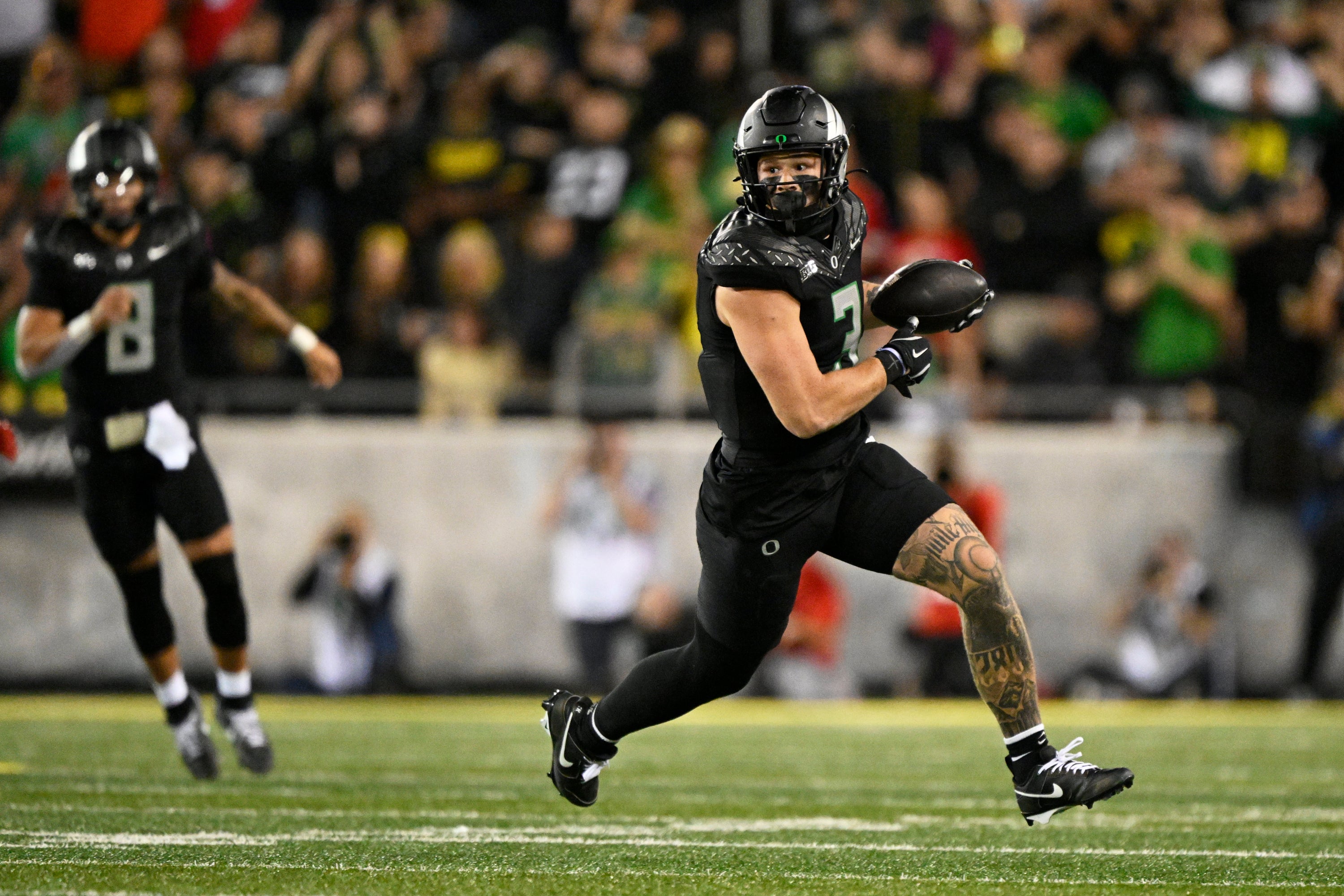 Oct 12, 2024; Eugene, Oregon, USA; Oregon Ducks tight end Terrance Ferguson (3) catches a pass for a first down during the second half against the Ohio State Buckeyes at Autzen Stadium.