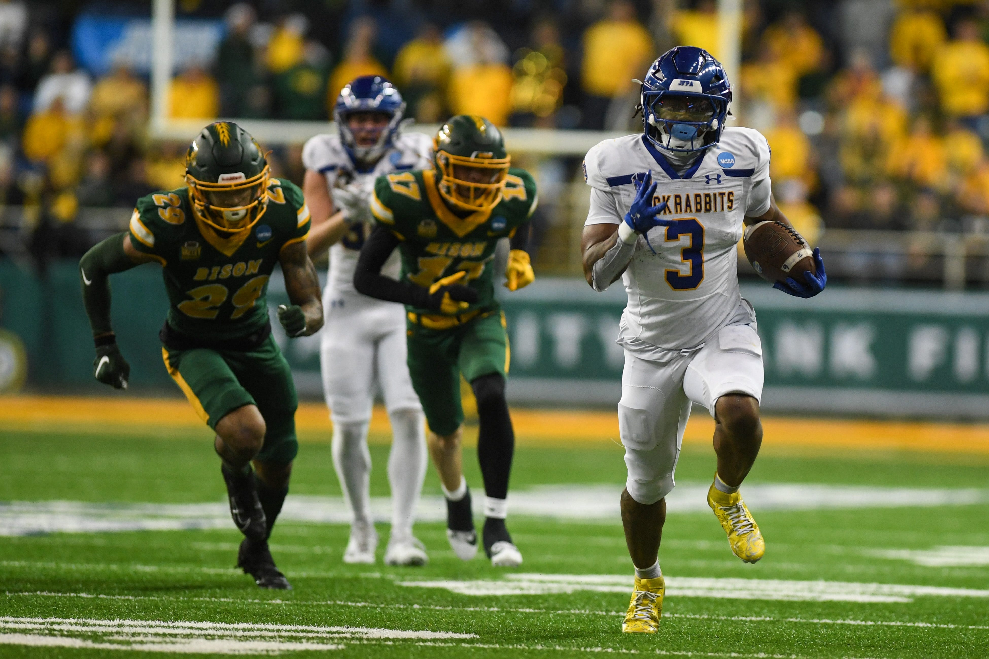 South Dakota State Jackrabbits running back Amar Johnson (3) rushes the ball to the end zone for the touchdown on Saturday, Dec. 21, 2024, at Fargodome in Fargo, Nouth Dakota.