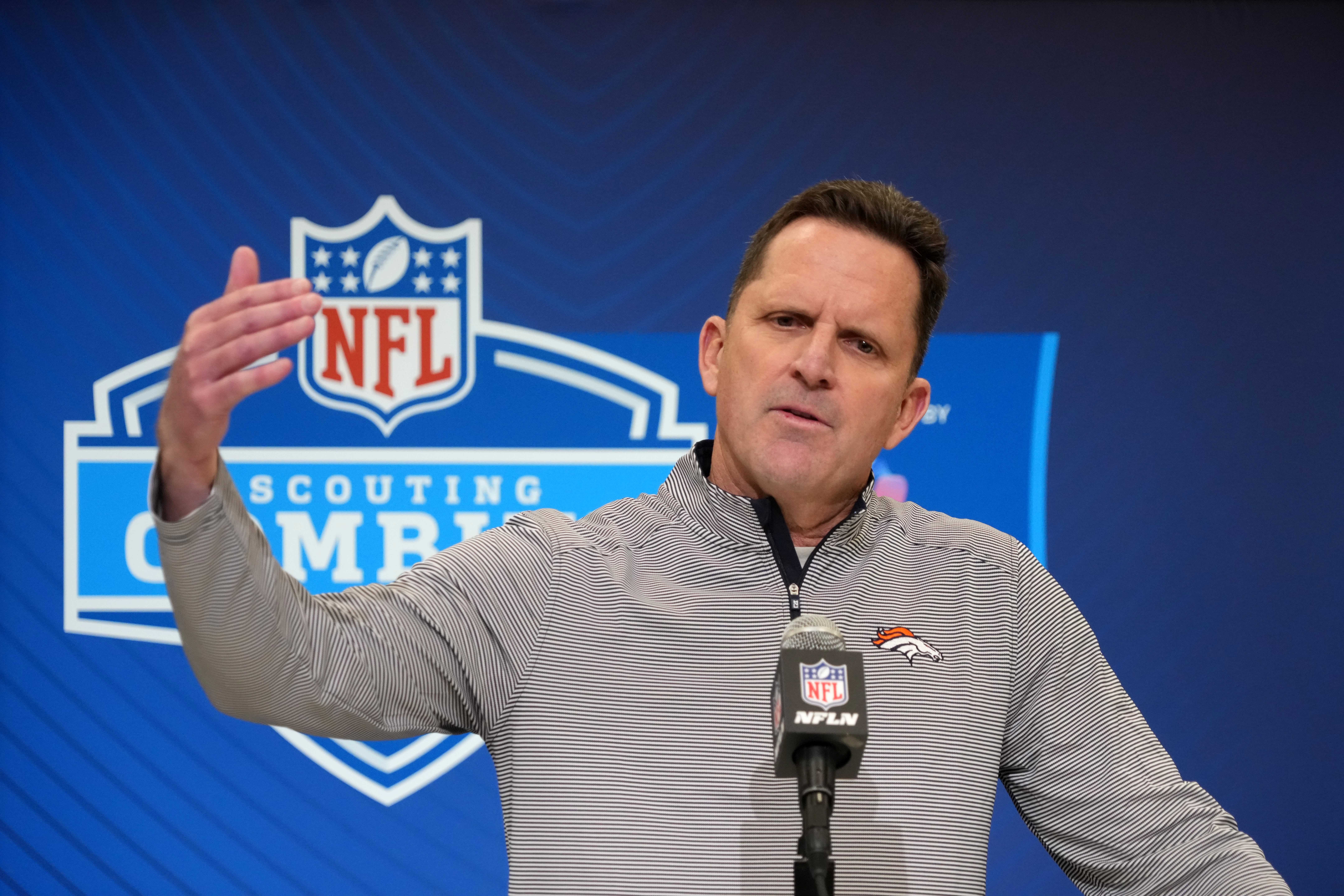 Feb 25, 2025; Indianapolis, IN, USA; Denver Broncos general manager George Paton speaks during the NFL Scouting Combine at the Indiana Convention Center.
