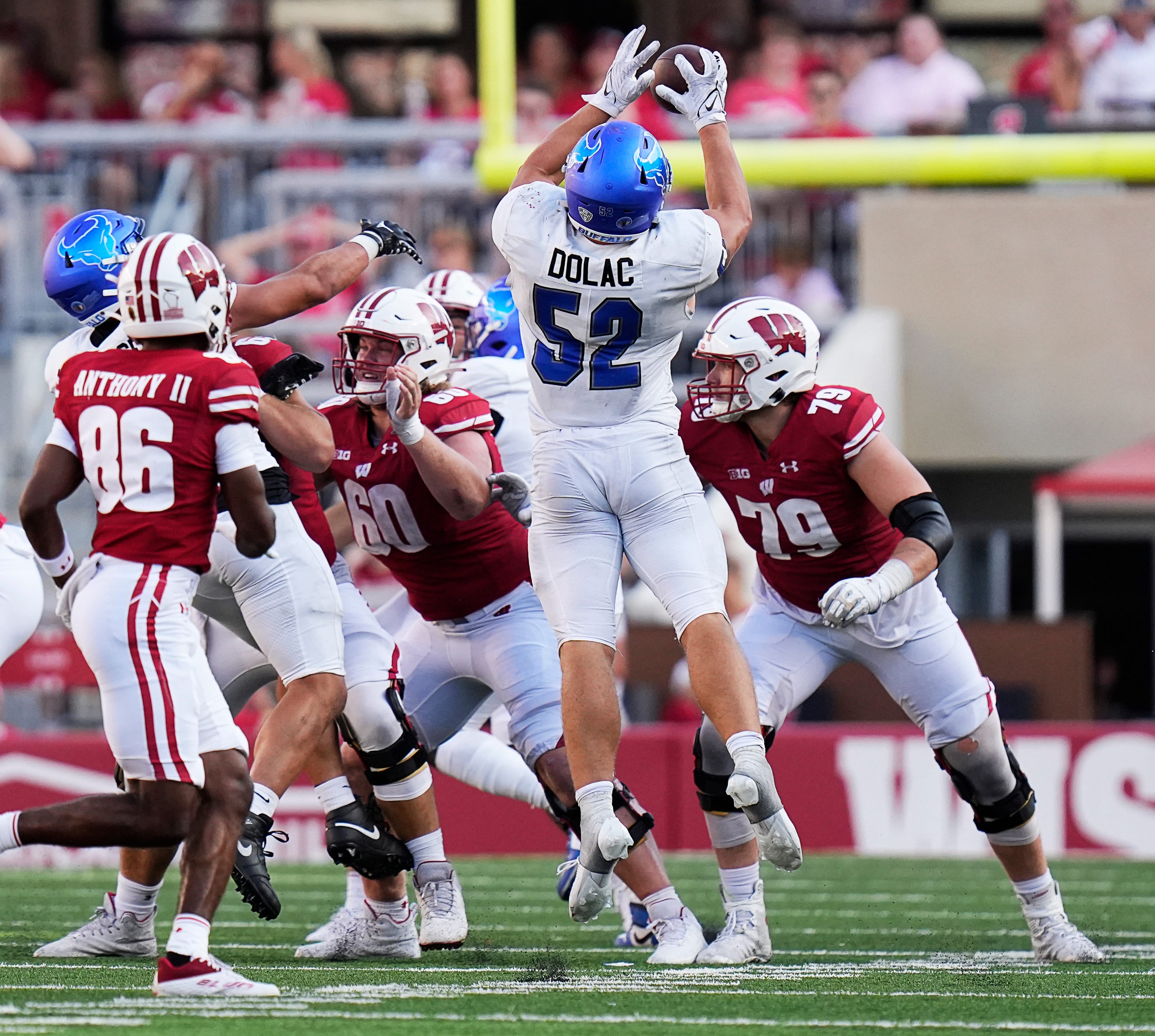 Buffalo linebacker Shaun Dolac (52) intercepts the ball during the fourth quarter of the game on Saturday September 2, 2023 at Camp Randall Stadium in Madison, Wis.
