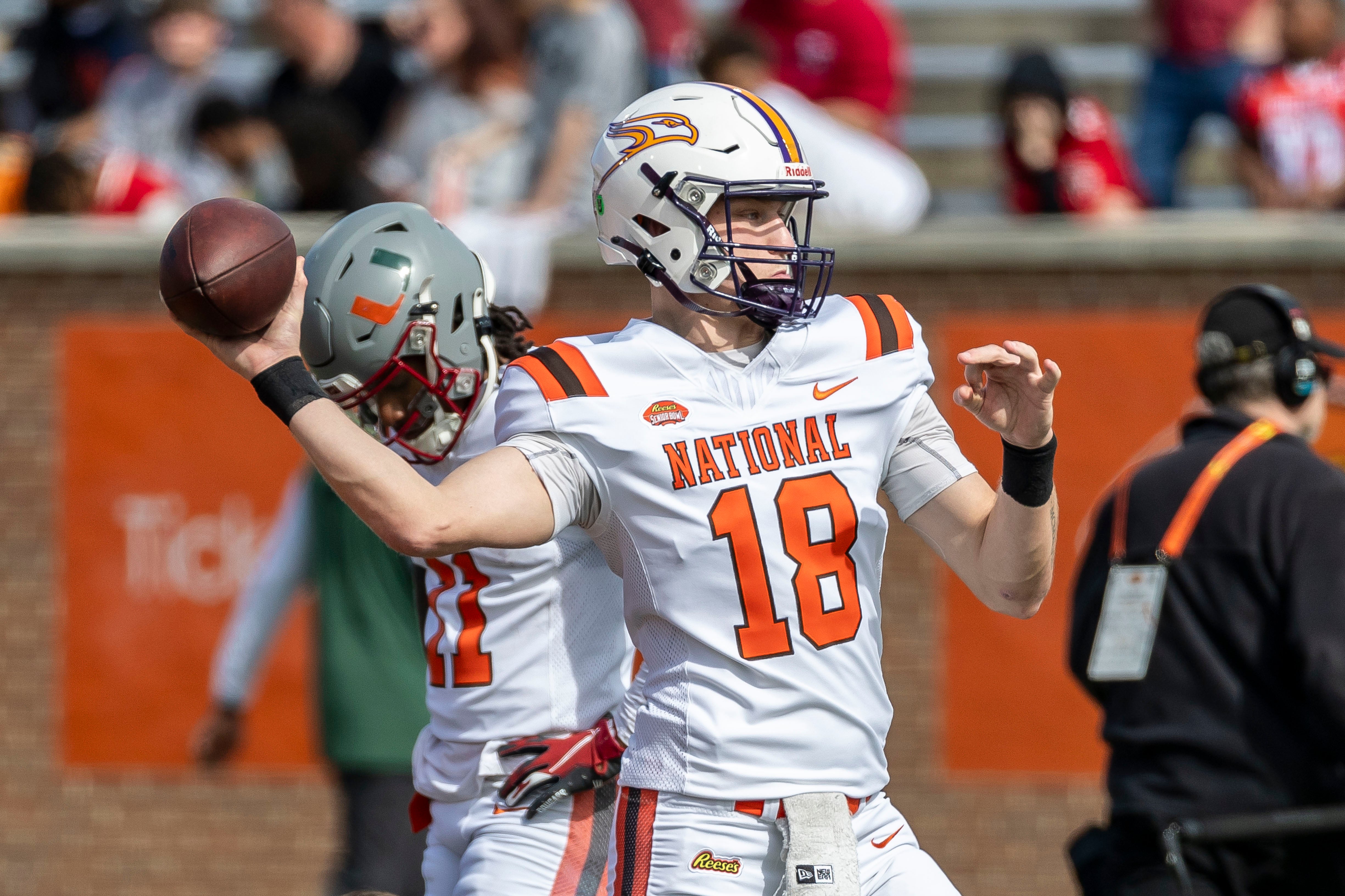 National team quarterback Taylor Elgersma of Laurier (18) warms up before the 2025 Senior Bowl football game at Hancock Whitney Stadium.