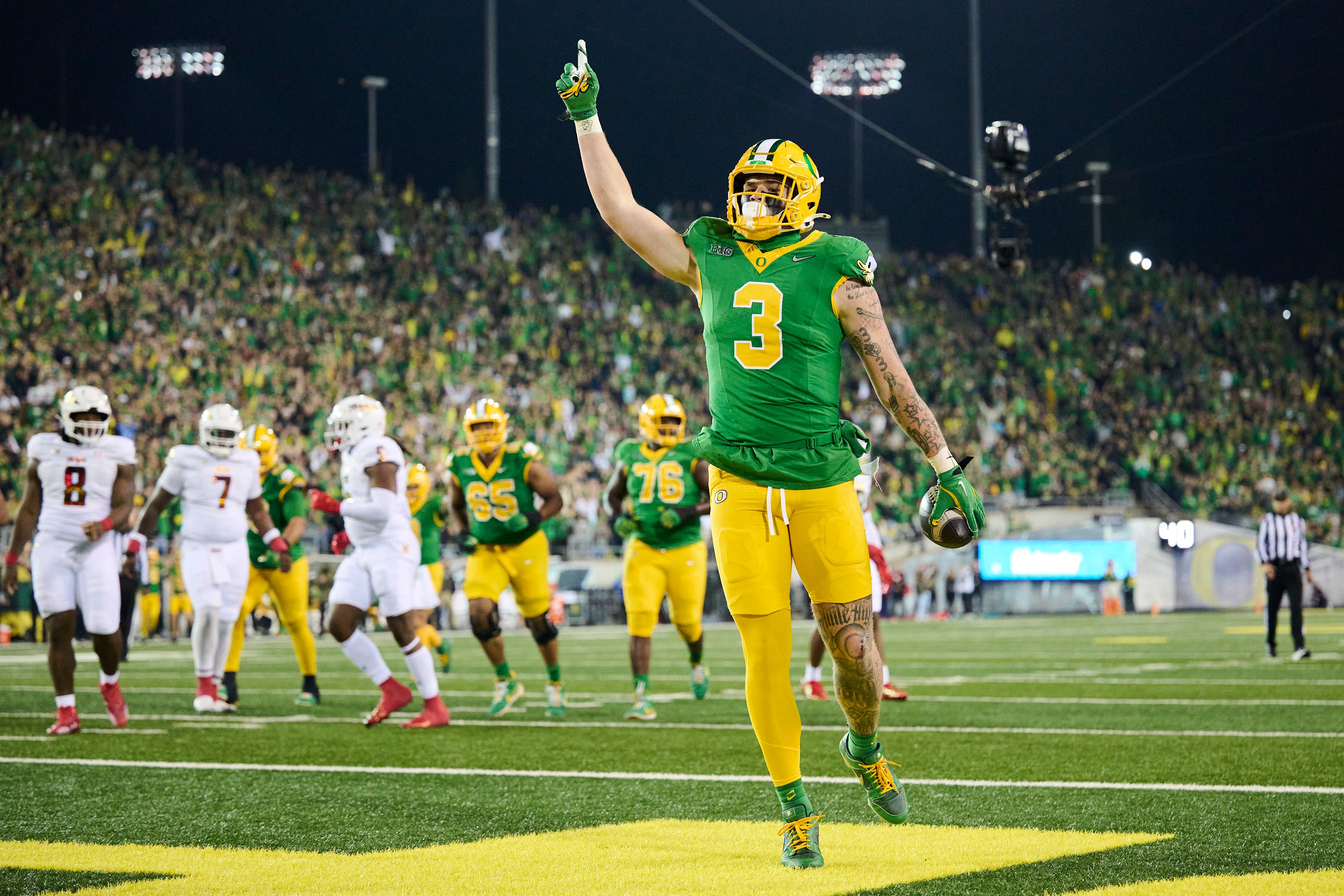 Nov 9, 2024; Eugene, Oregon, USA; Oregon Ducks tight end Terrance Ferguson (3) celebrates after catching a touchdown pass during the first half against the Maryland Terrapins at Autzen Stadium. 