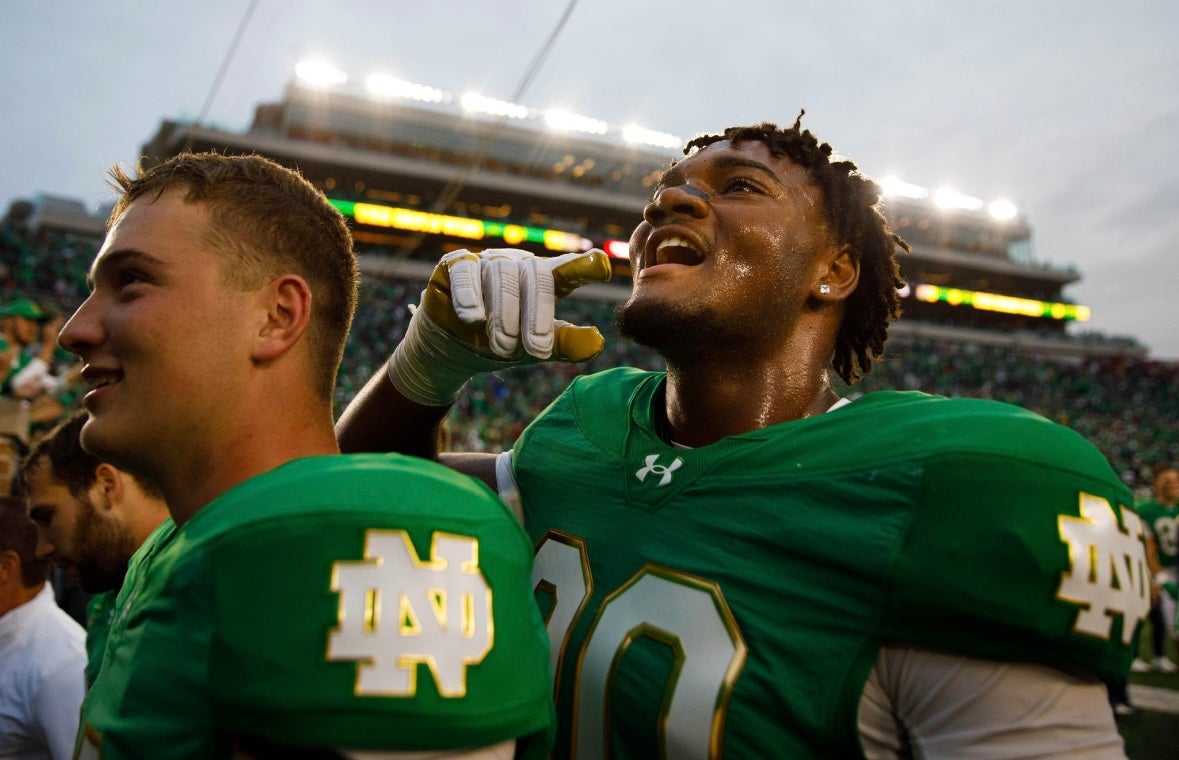 Notre Dame defensive lineman Bryce Young, right, celebrates after winning a NCAA college football game 31-24 between Notre Dame and Louisville at Notre Dame Stadium on Saturday, Sept. 28, 2024, in South Bend.