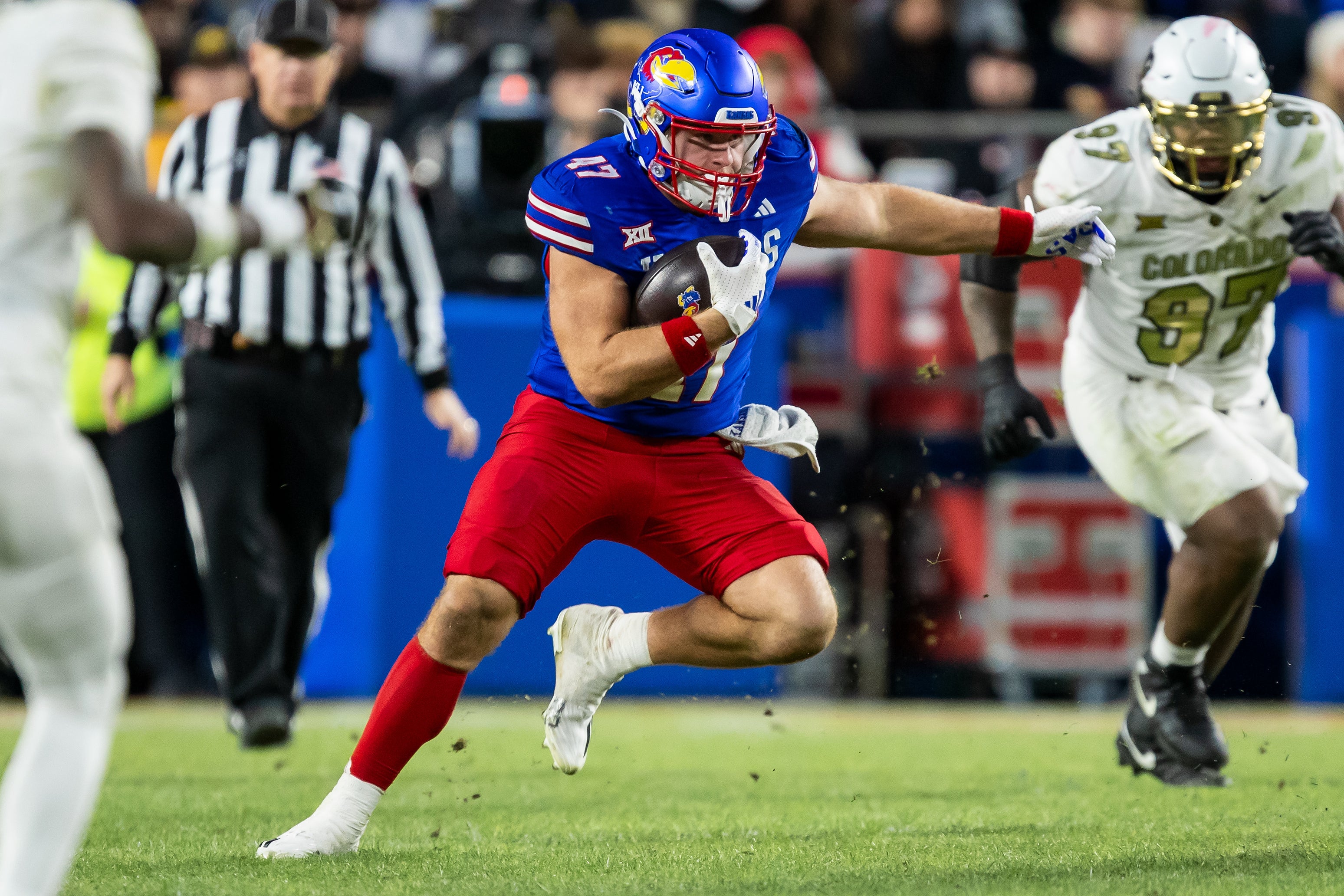 Kansas tight end Jared Casey (47) catches the ball for extra yardage during the 4th quarter between the Kansas Jayhawks and the Colorado Buffaloes