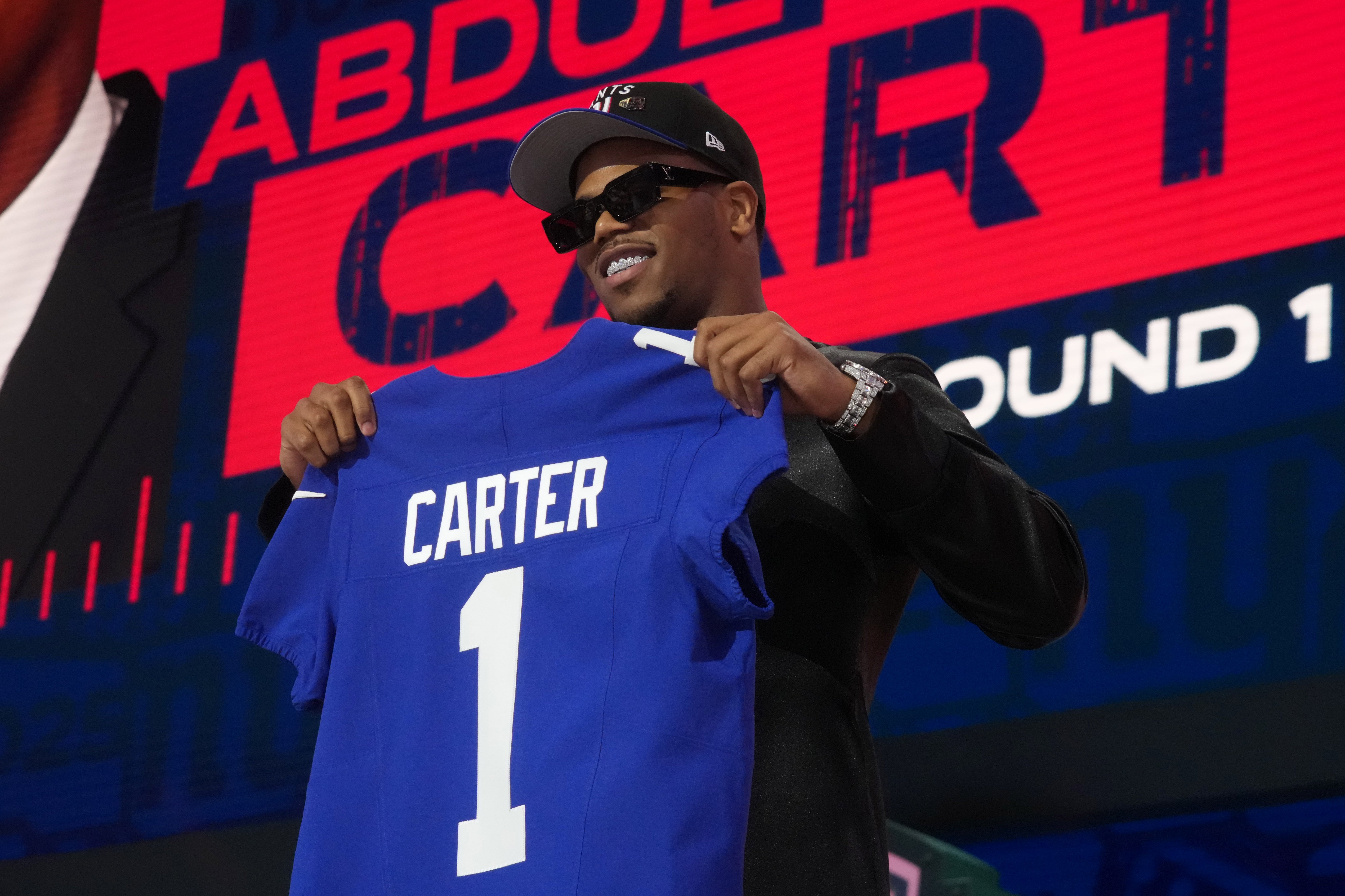 Apr 24, 2025; Green Bay, WI, USA; Penn State Nittany Lions defensive end Abdul Carter is selected by the New York Giants as the number three pick in the first round of the 2025 NFL Draft at Lambeau Field.