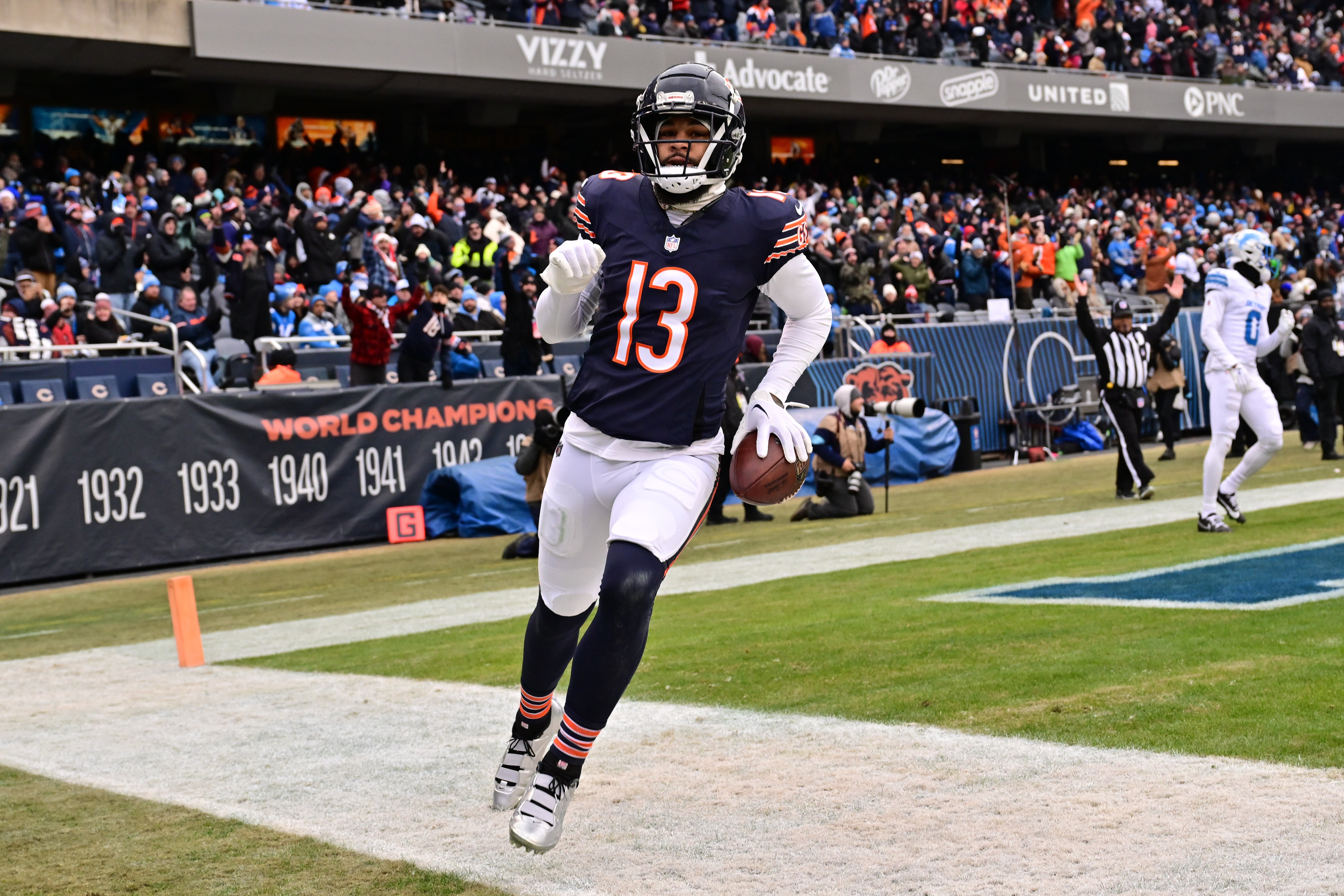 Chicago Bears wide receiver Keenan Allen (13) reacts after a touchdown reception against the Detroit Lions during the second quarter at Soldier Field.
