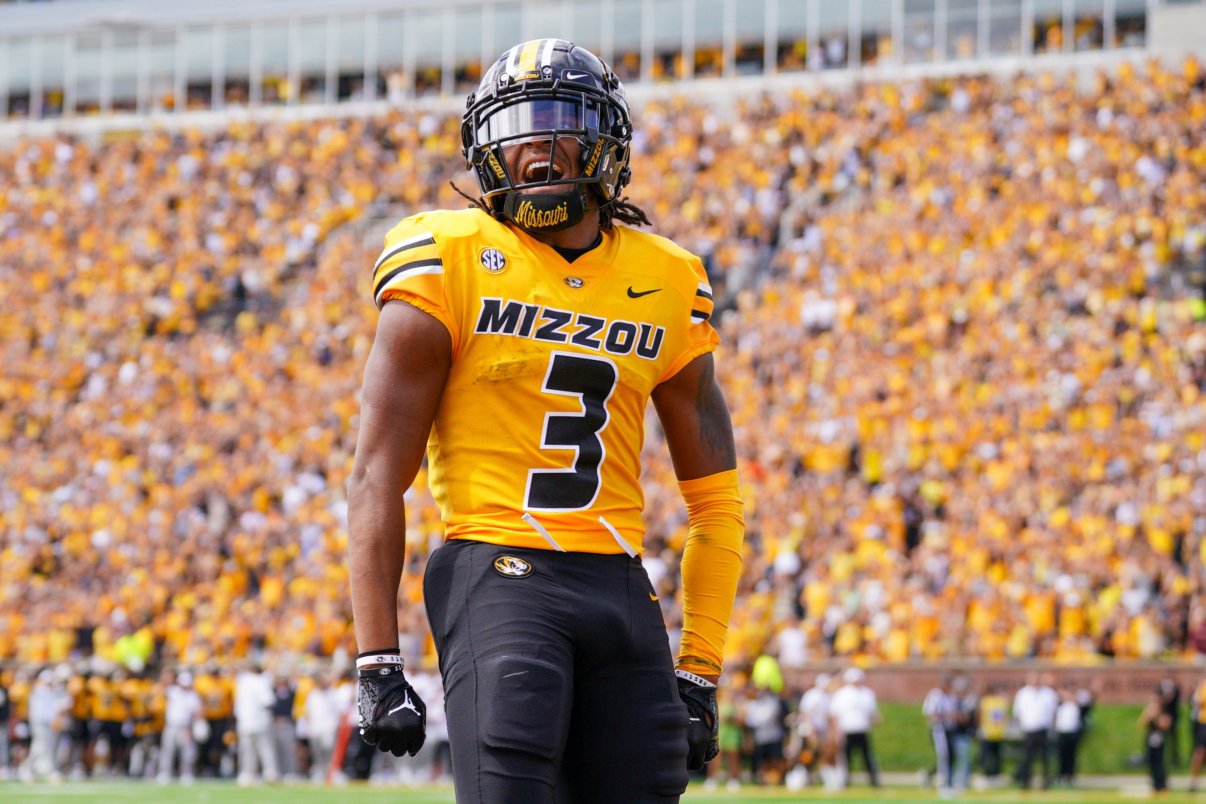 Sep 14, 2024; Columbia, Missouri, USA; Missouri Tigers wide receiver Luther Burden III (3) celebrates after scoring a touchdown against the Boston College Eagles during the first half at Faurot Field at Memorial Stadium.