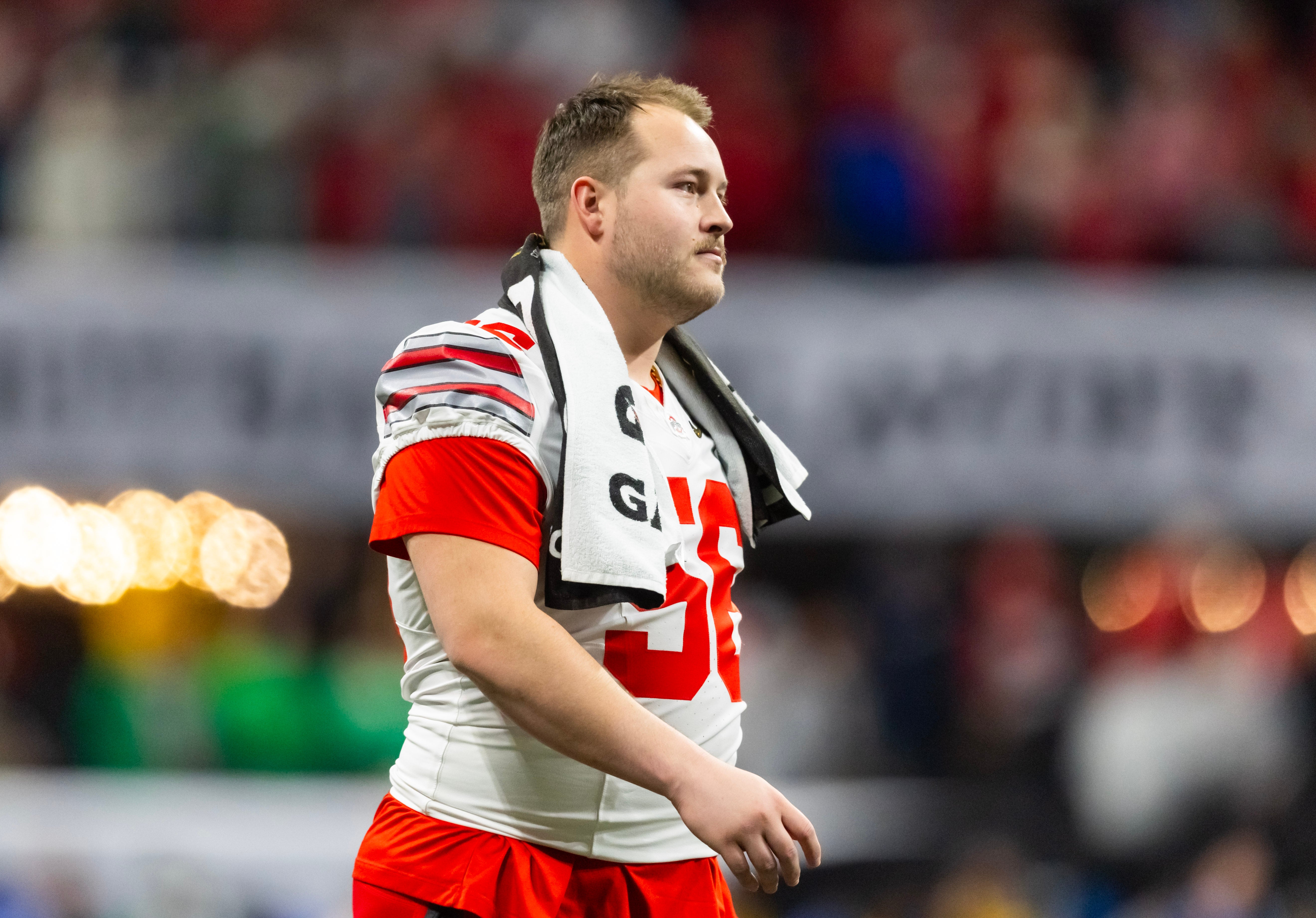 Jan 20, 2025; Atlanta, GA, USA; Ohio State Buckeyes offensive lineman Seth McLaughlin (56) against the Notre Dame Fighting Irish during the CFP National Championship college football game at Mercedes-Benz Stadium.