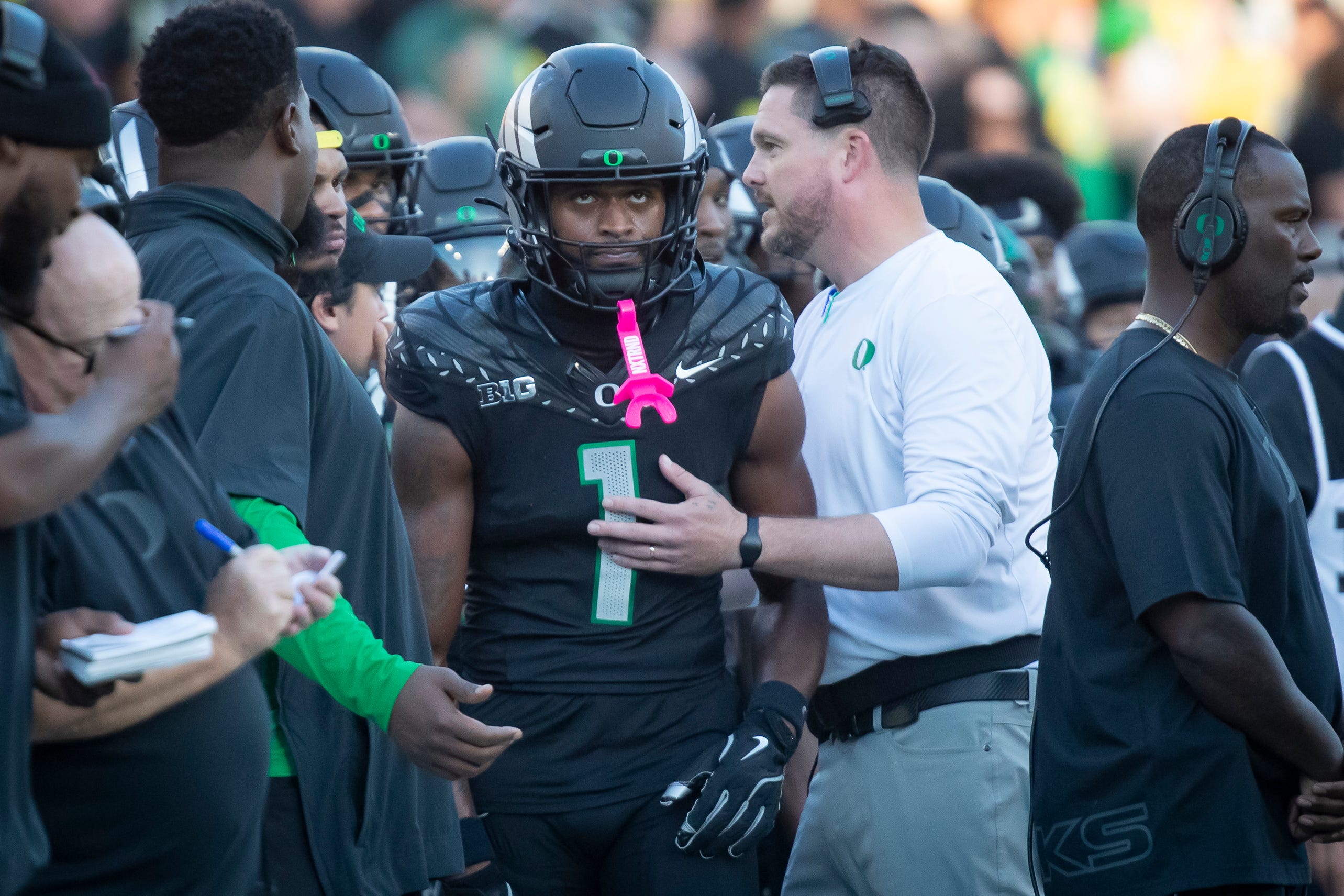 Oregon Ducks head coach Dan Lanning and Oregon Ducks wide receiver Traeshon Holden as Holden is ejected over a spitting incident as the No. 3 Oregon Ducks host the No. 2 Ohio State Buckeyes Saturday, Oct. 12, 2024 at Autzen Stadium in Eugene, Ore.
