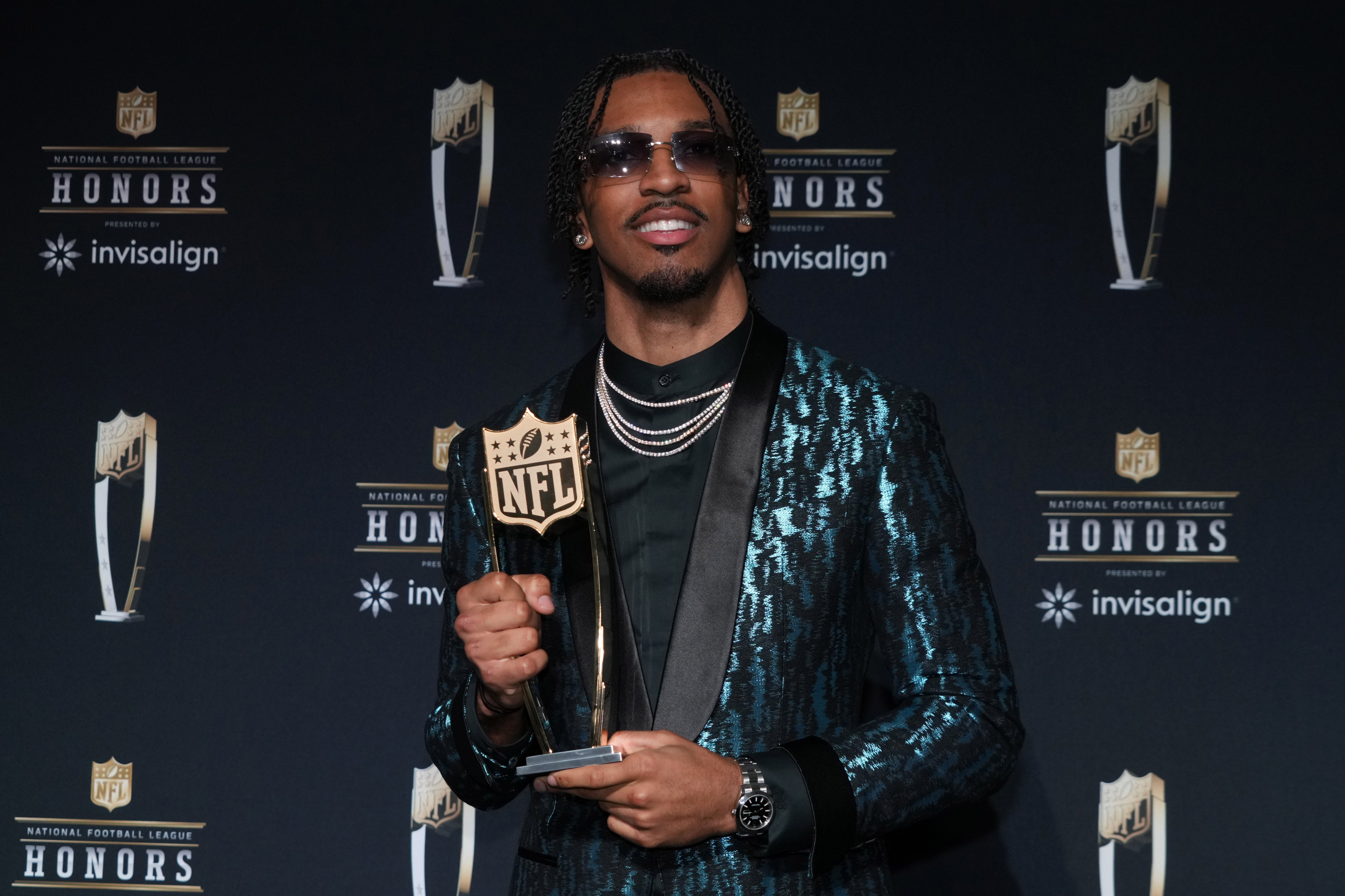Feb 6, 2025; New Orleans, LA, USA; Washington Commanders quarterback Jayden Daniels poses with the Offensive Rookie of the Year award during Super Bowl LIX NFL Honors at Saenger Theatre.