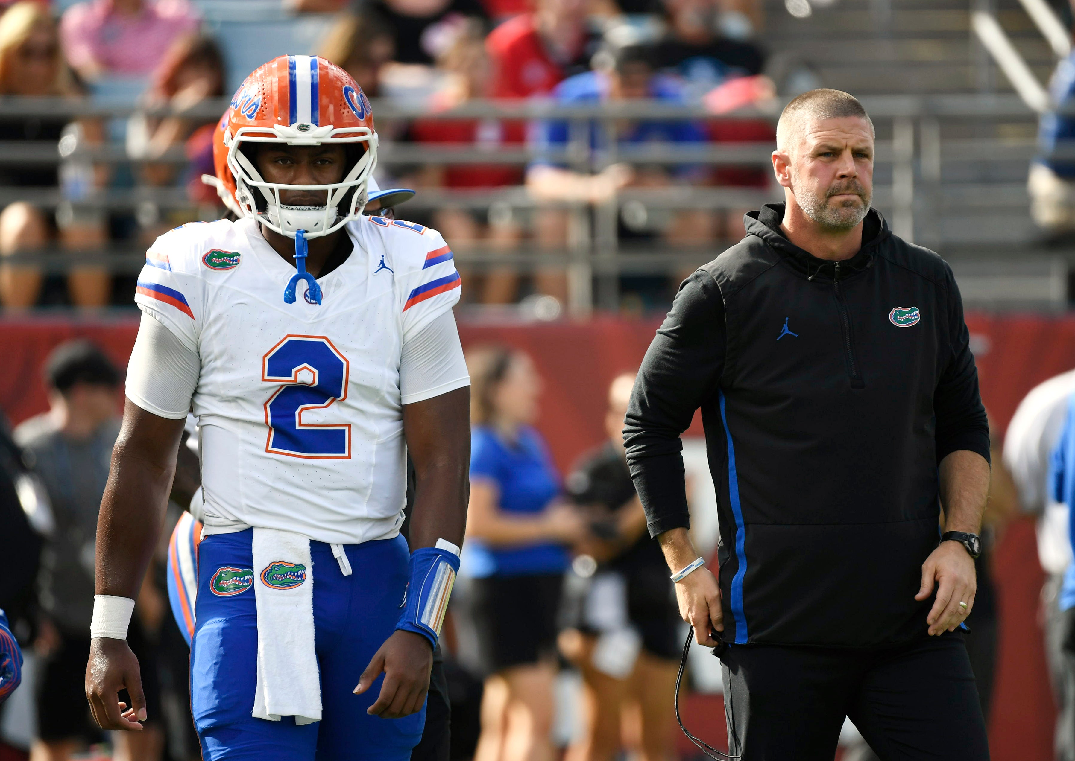 Nov 2, 2024; Jacksonville, Florida, USA; Florida Gators head coach Billy Napier and quarterback DJ Lagway (2) before a game against the Georgia Bulldogs at EverBank Stadium.