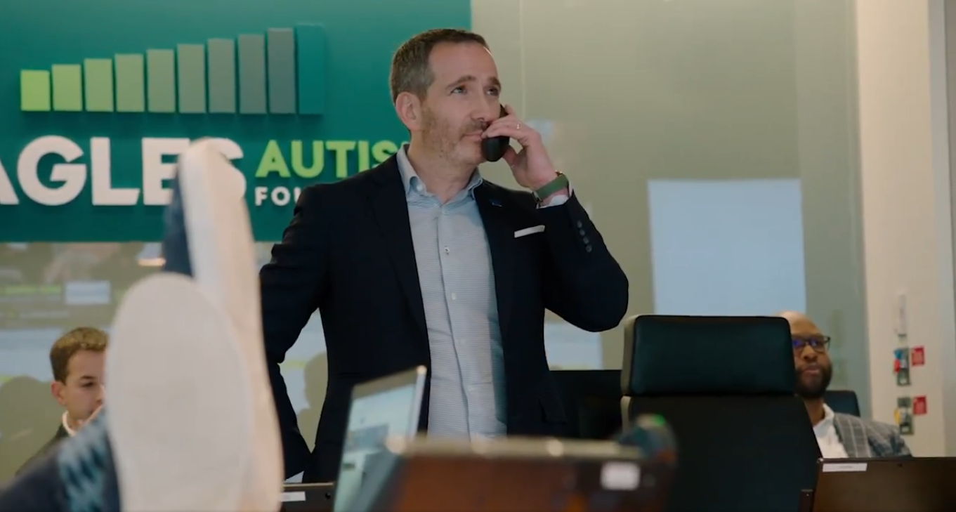Eagles GM Howie Roseman on the phone with Chiefs GM Brett Veach during the 2025 NFL Draft.