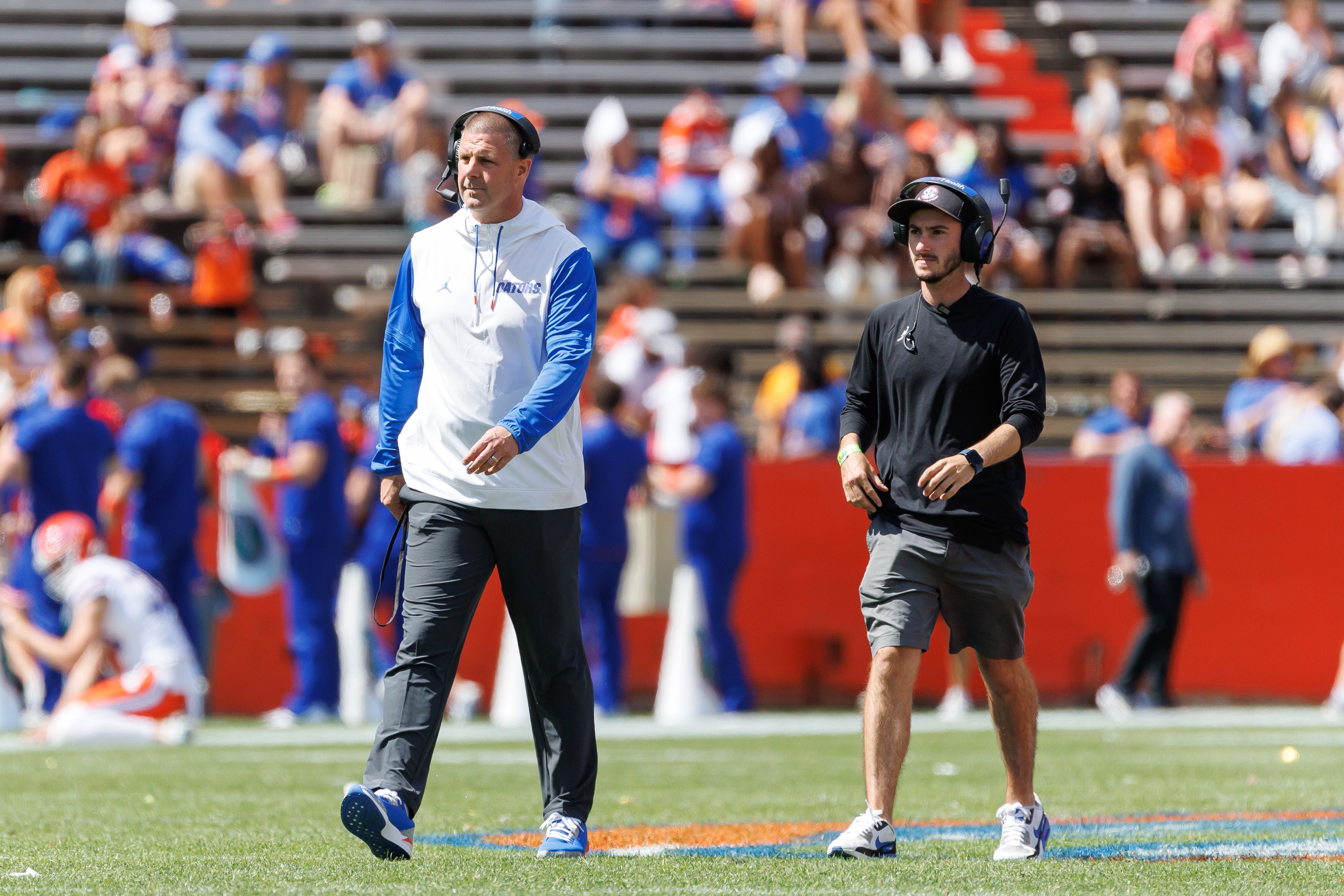 Apr 12, 2025; Gainesville, FL, USA; Florida Gators head coach Billy Napier walks on the field during the second half of the Orange & Blue spring game at Ben Hill Griffin Stadium.
